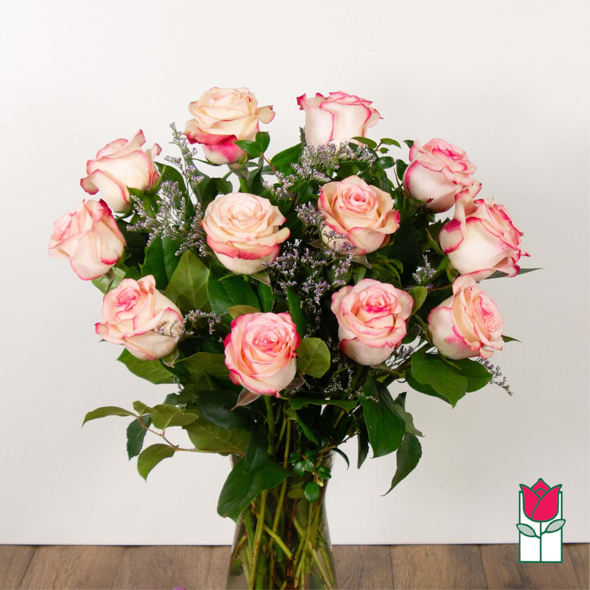 Indulge in the timeless elegance of our Medium Stem Rose Arrangement, meticulously