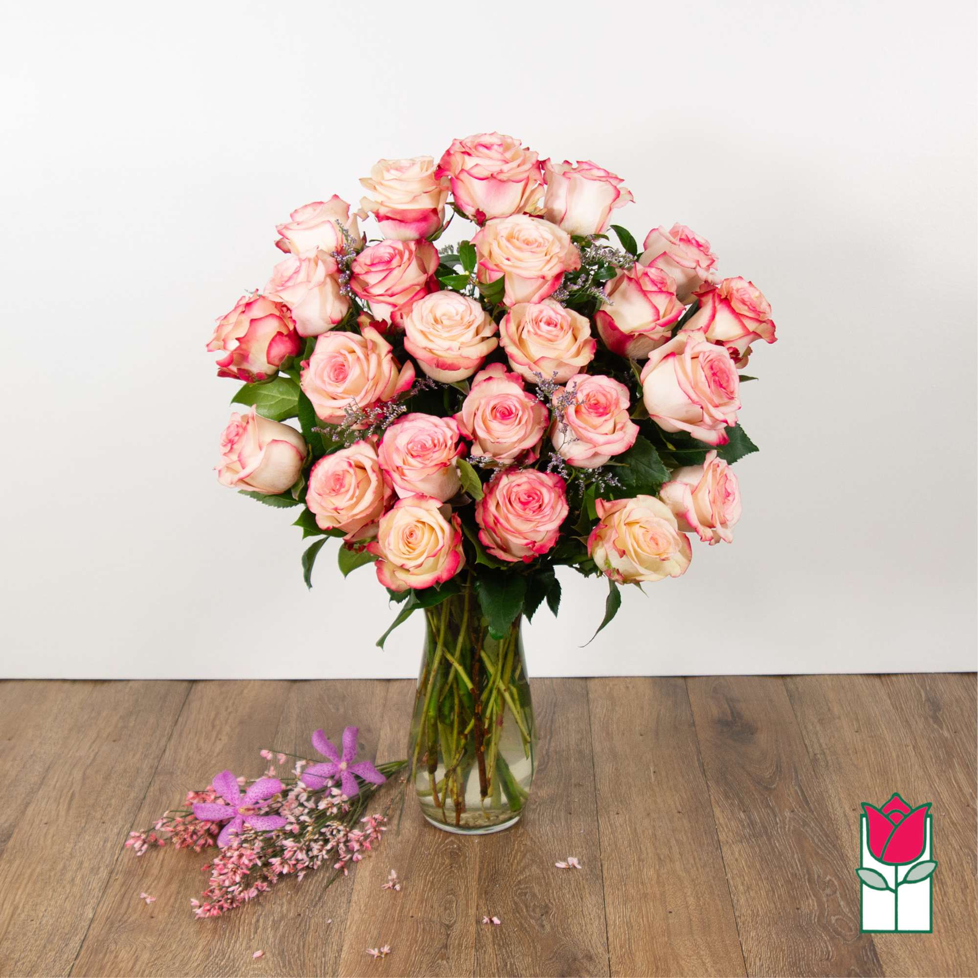 Indulge in the timeless elegance of our Medium Stem Rose Arrangement, meticulously