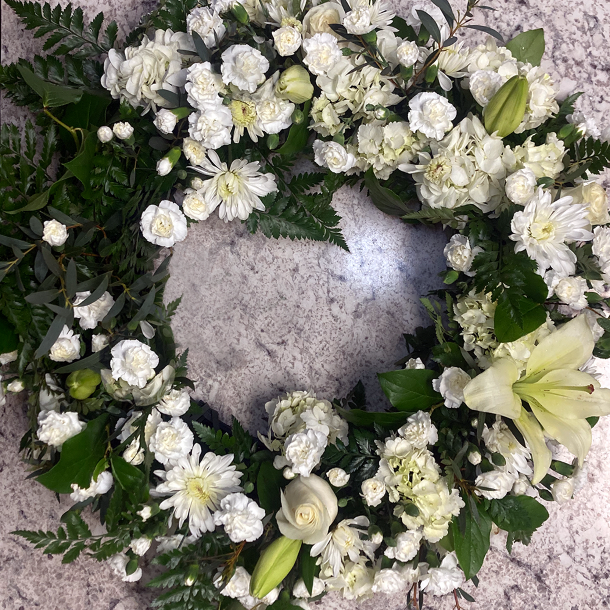 A tranquil urn wreath that honors cherished memories with grace, showcasing a
