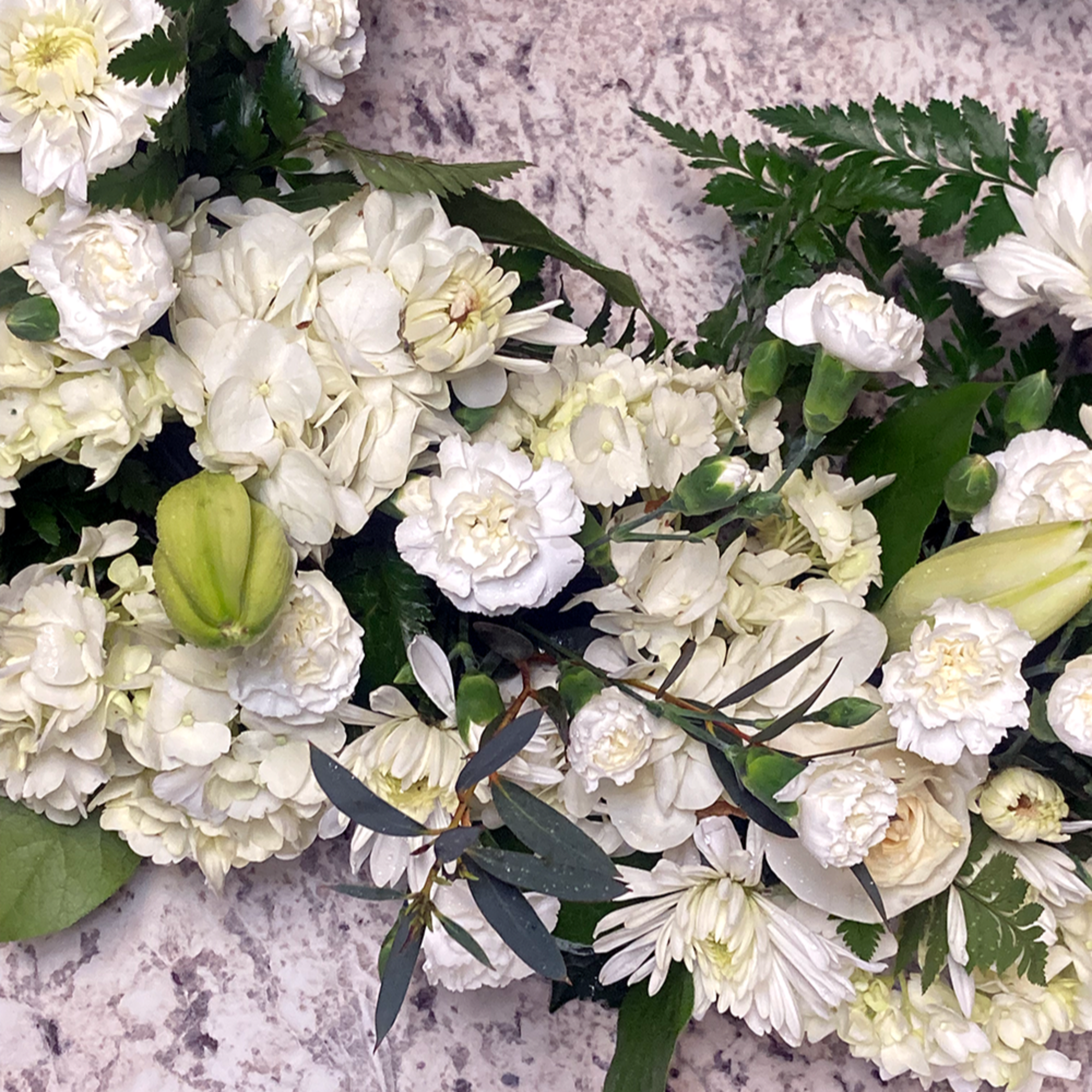 A tranquil urn wreath that honors cherished memories with grace, showcasing a