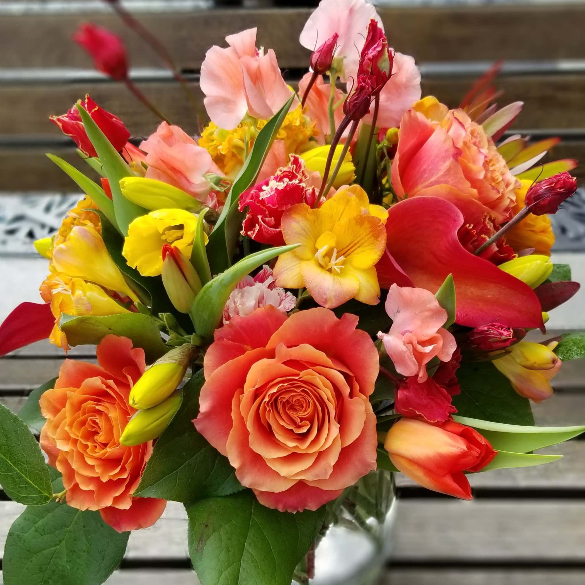 Vibrant flowers shine bright in this arrangement