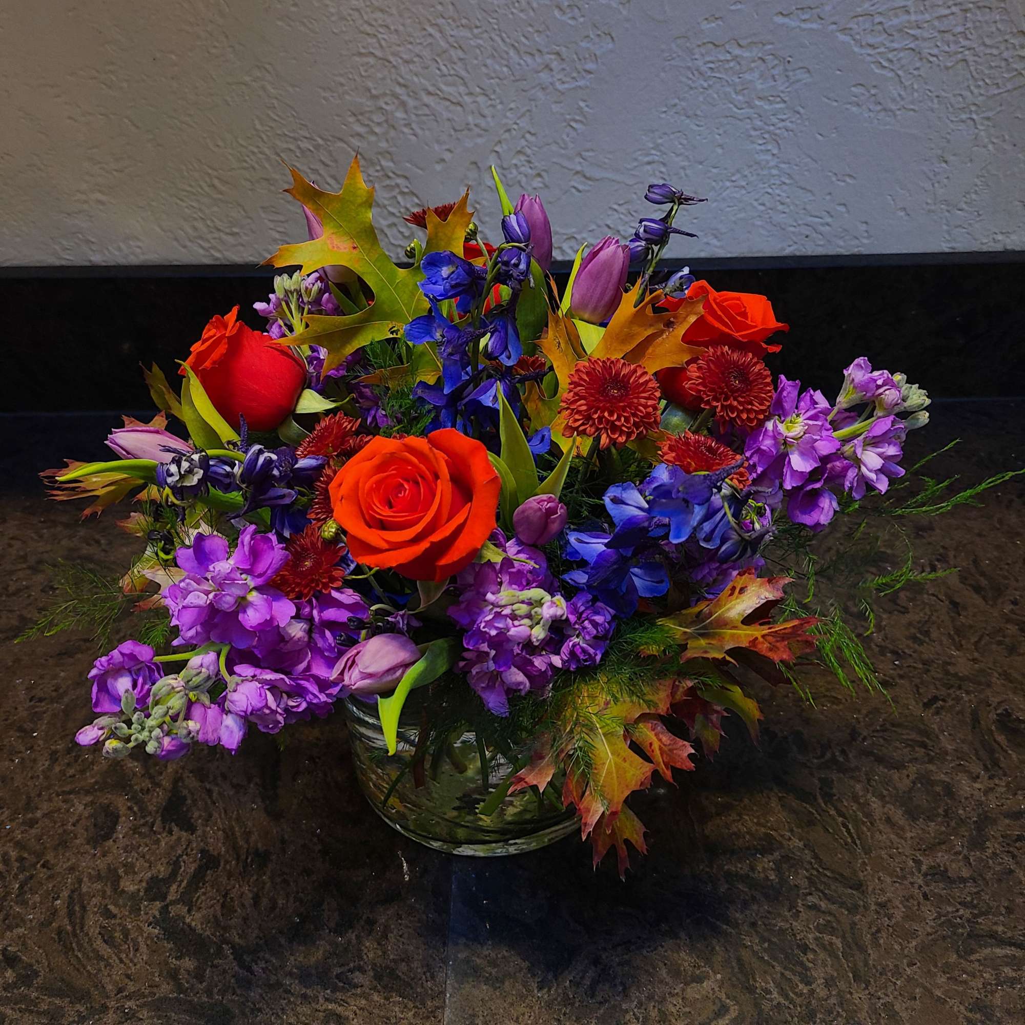 This richly colored medium size arrangement is the perfect way to dazzle