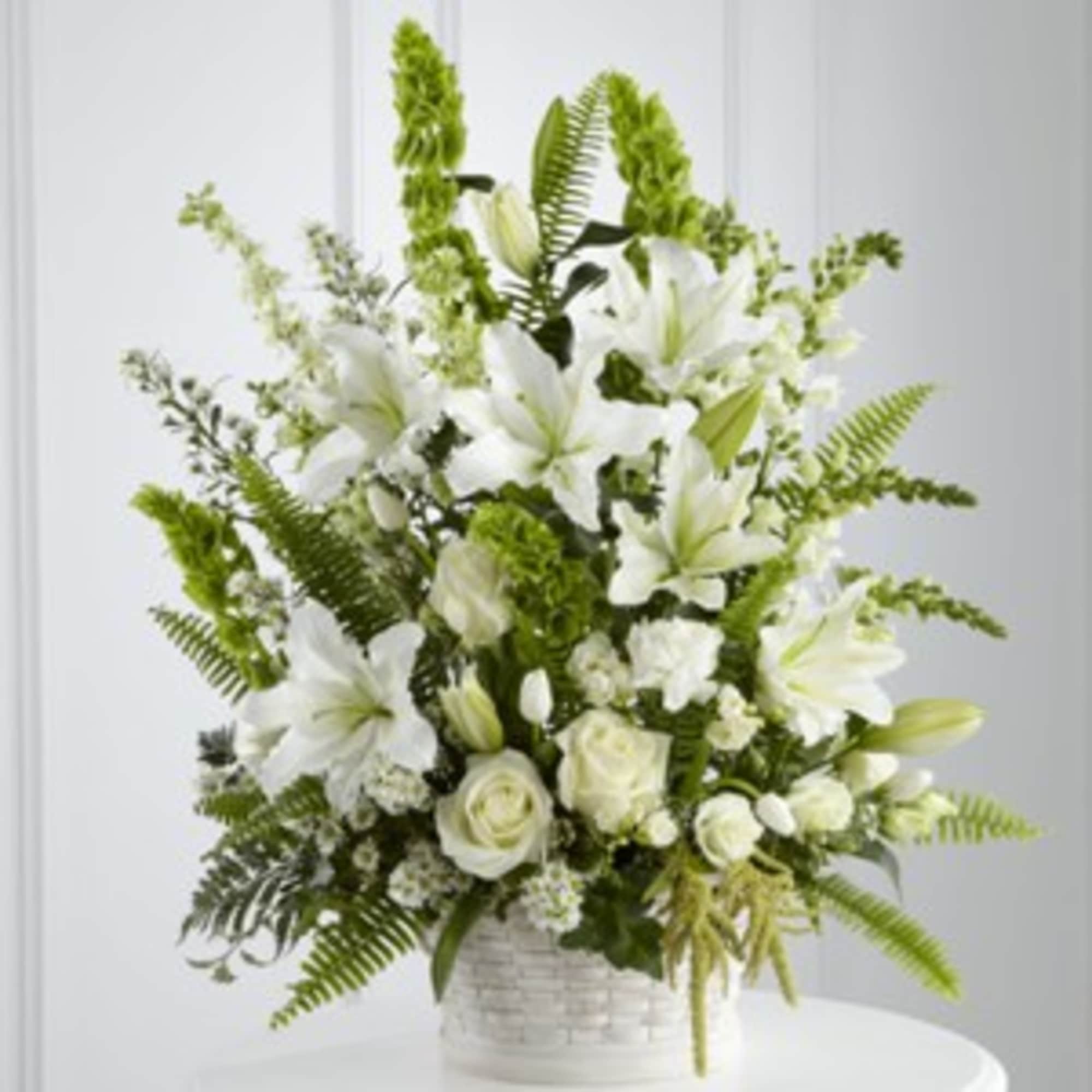 The In Our Thoughts Arrangement is a symbol of pure peace and