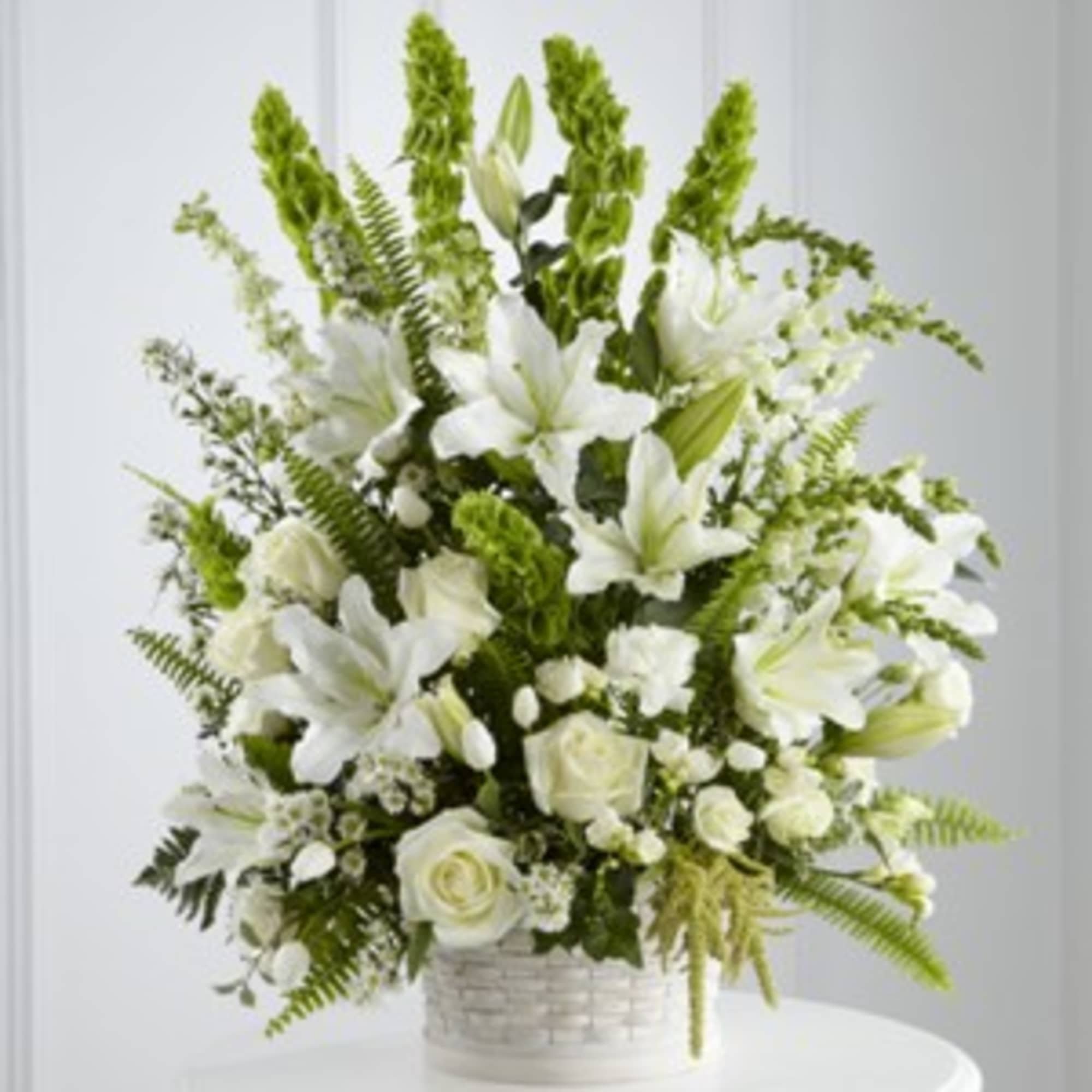 The In Our Thoughts Arrangement is a symbol of pure peace and