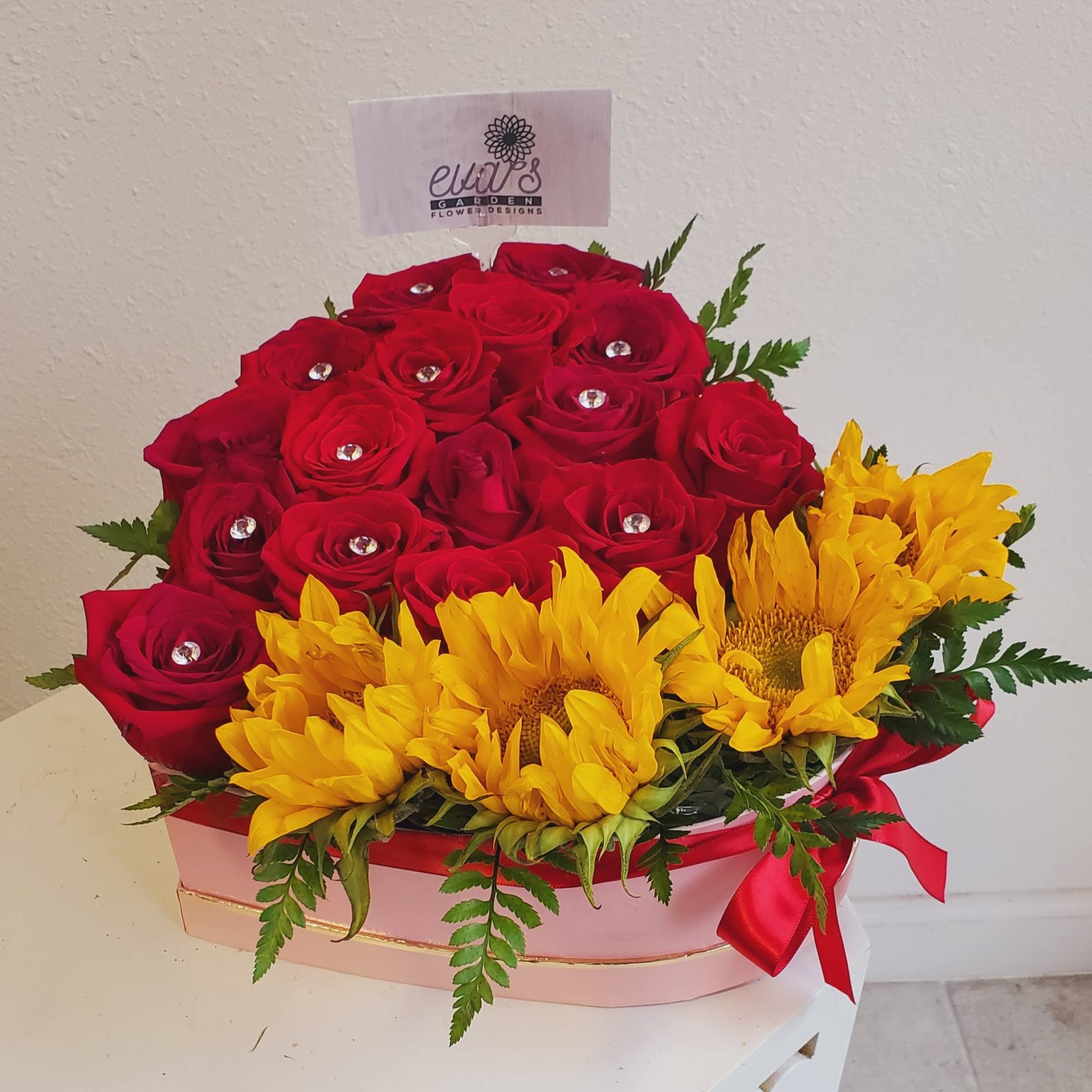 Standard Price: 16-18 Roses and 4 Sunflowers.
Deluxe Price: 22-24 Roses and 5