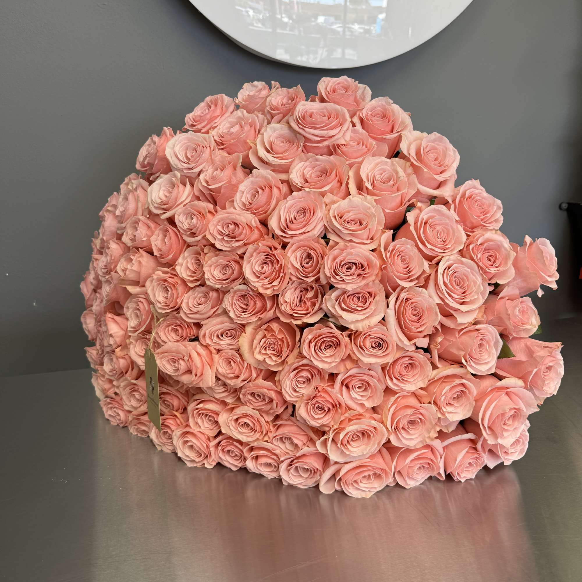 This long-stem, perfect light pink and delicate rose variety will set you