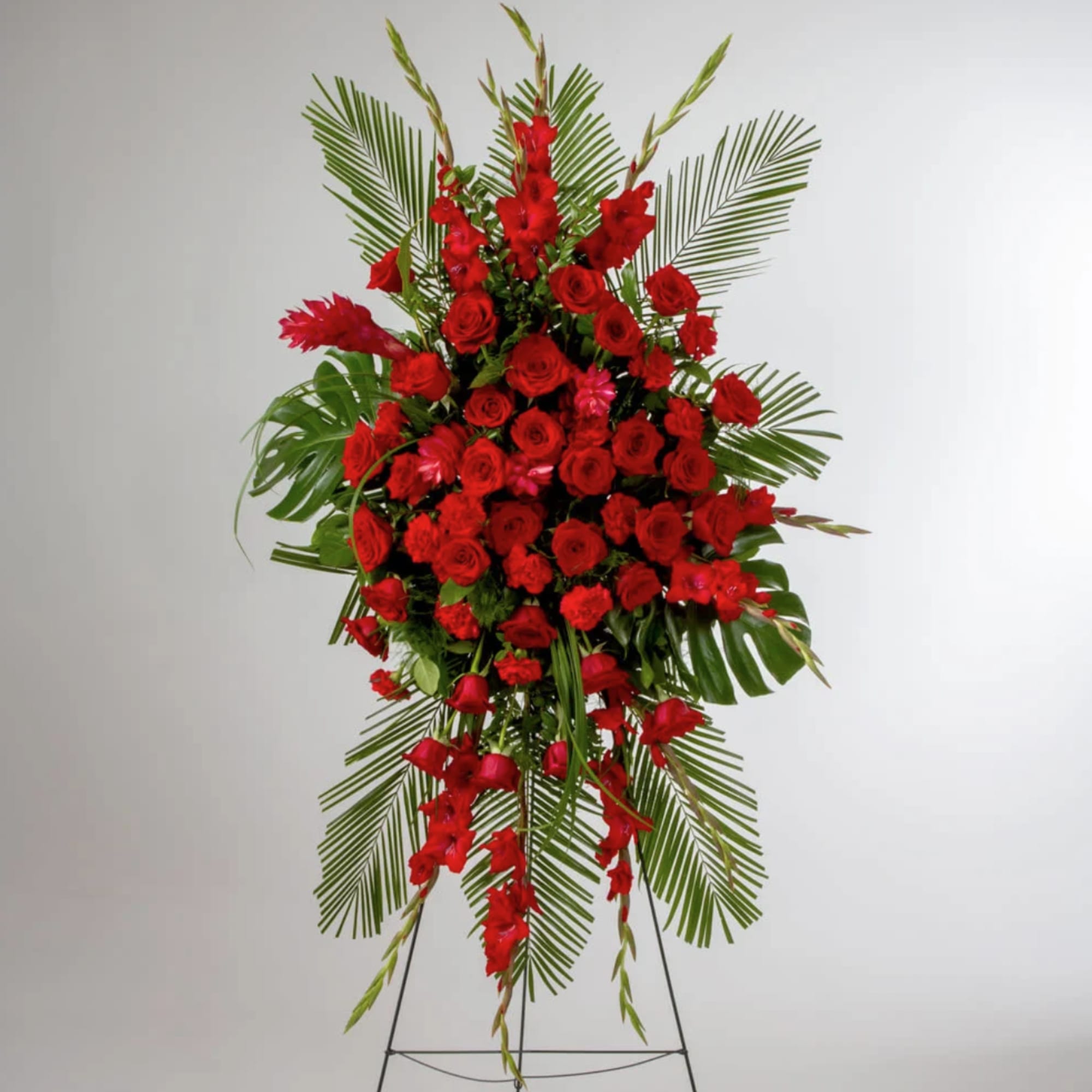 Red is the color of love and this standing spray displays it