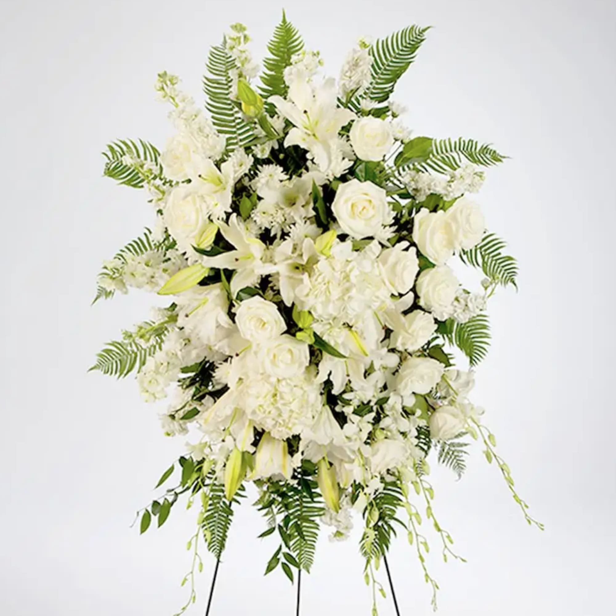 An all white tribute, this funeral spray is pure and tranquil. Featuring