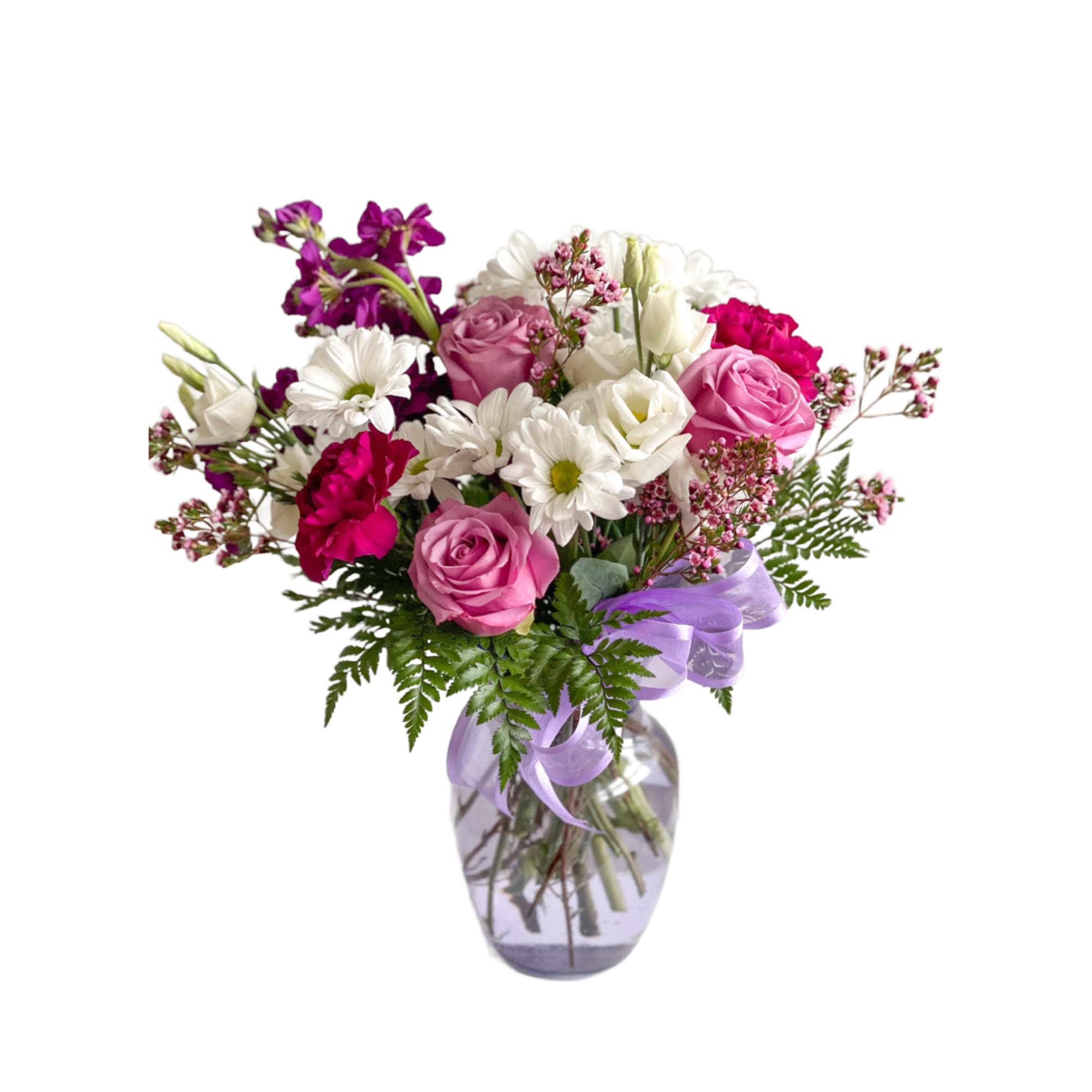 The Virginia is a mix of seasonal flowers in white and lavender. The Virginia is a mix of seasonal flowers in white and lavender.