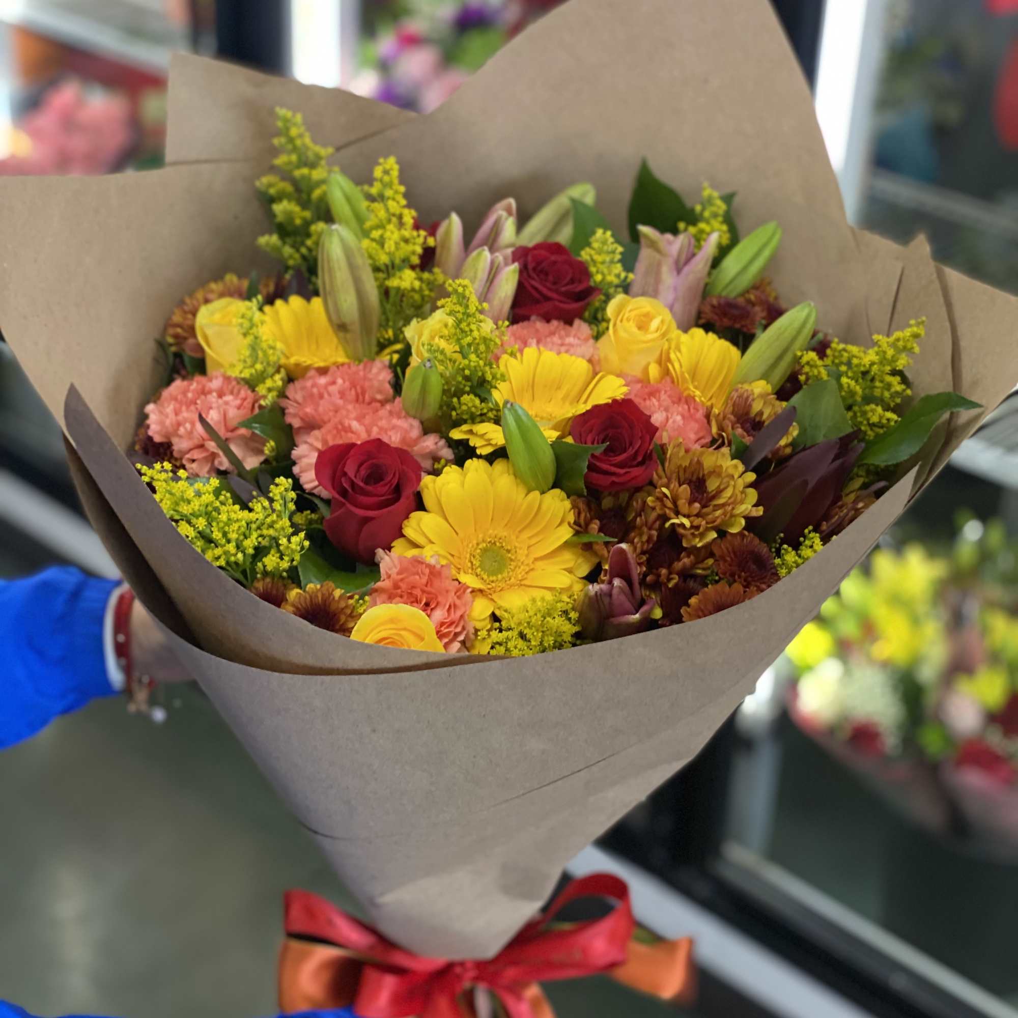 A mix of all our fall everyday stocked flowers! 
Wrapped in our