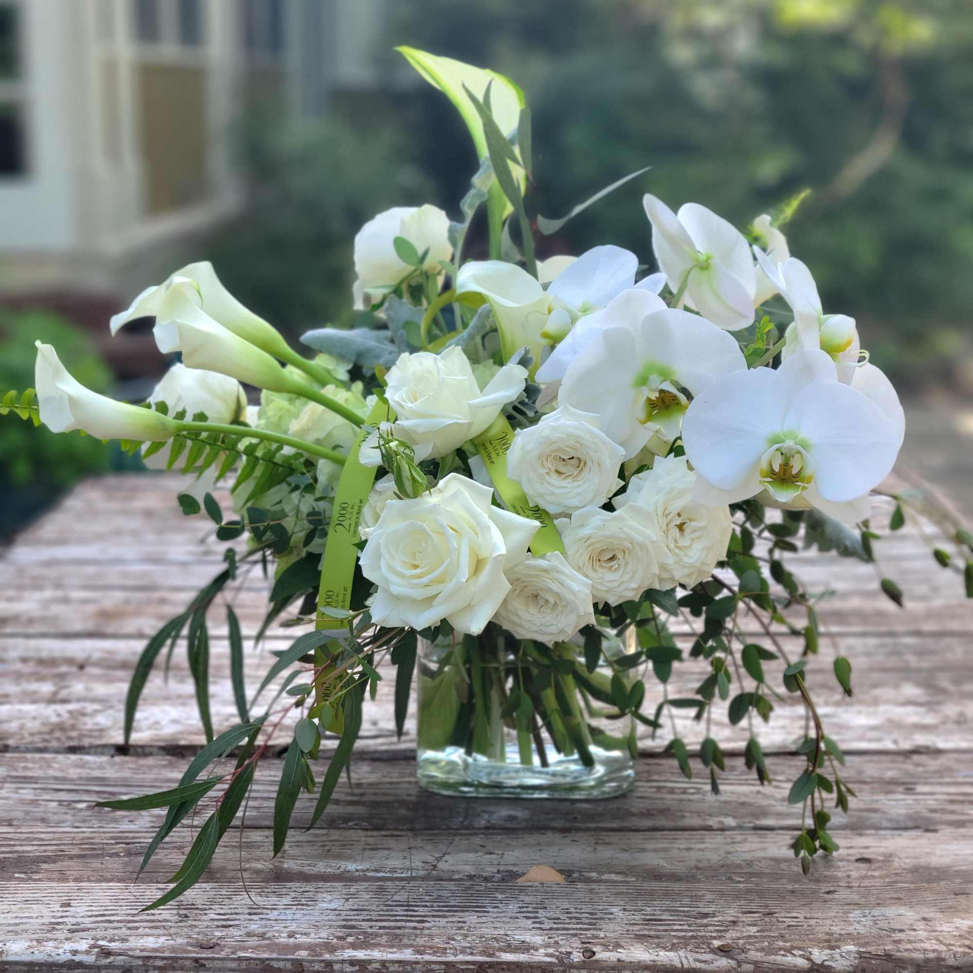 Joyful composition of white blooms in a variety of sizes and textures
