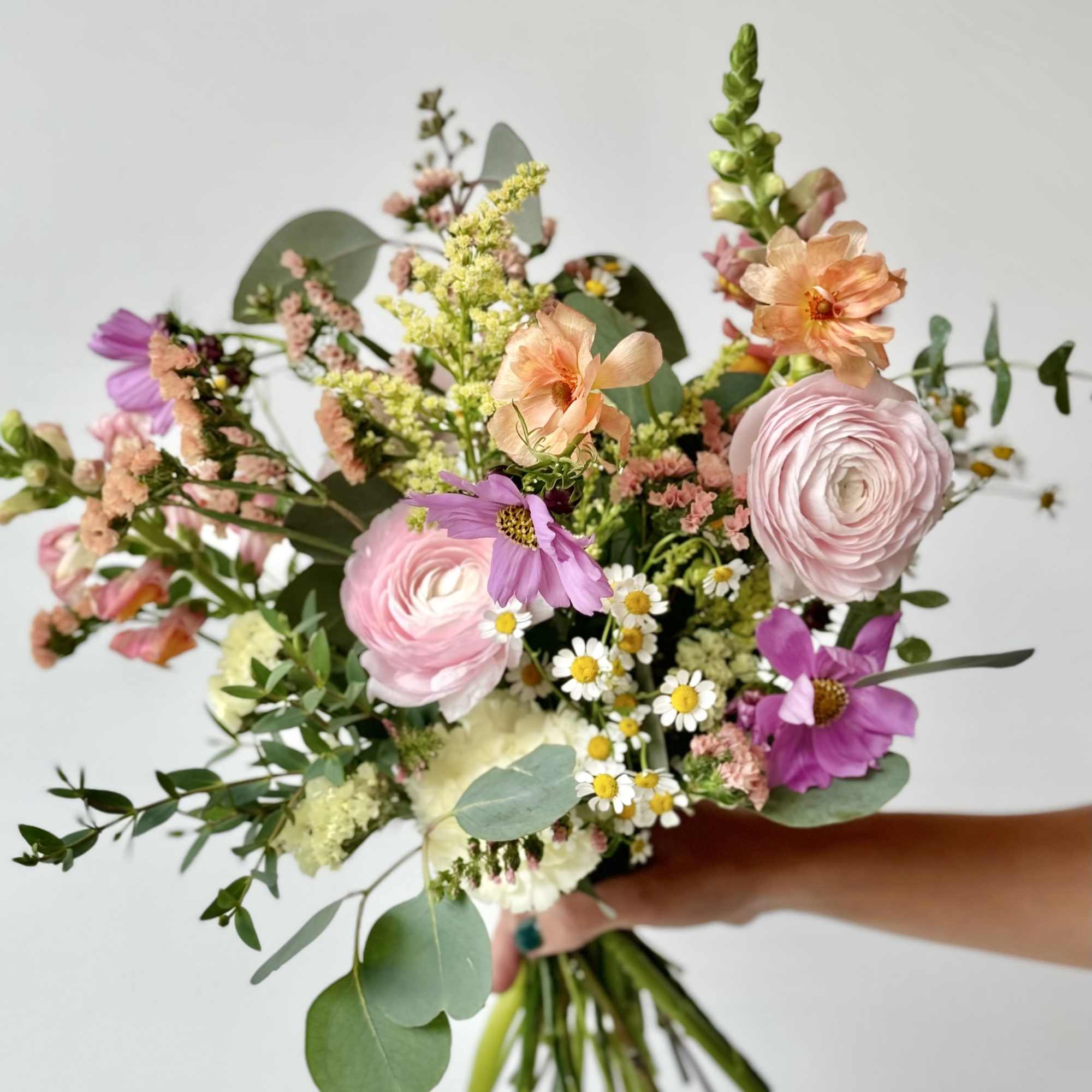 Experience a truly unique and captivating floral arrangement. Our florists craft each