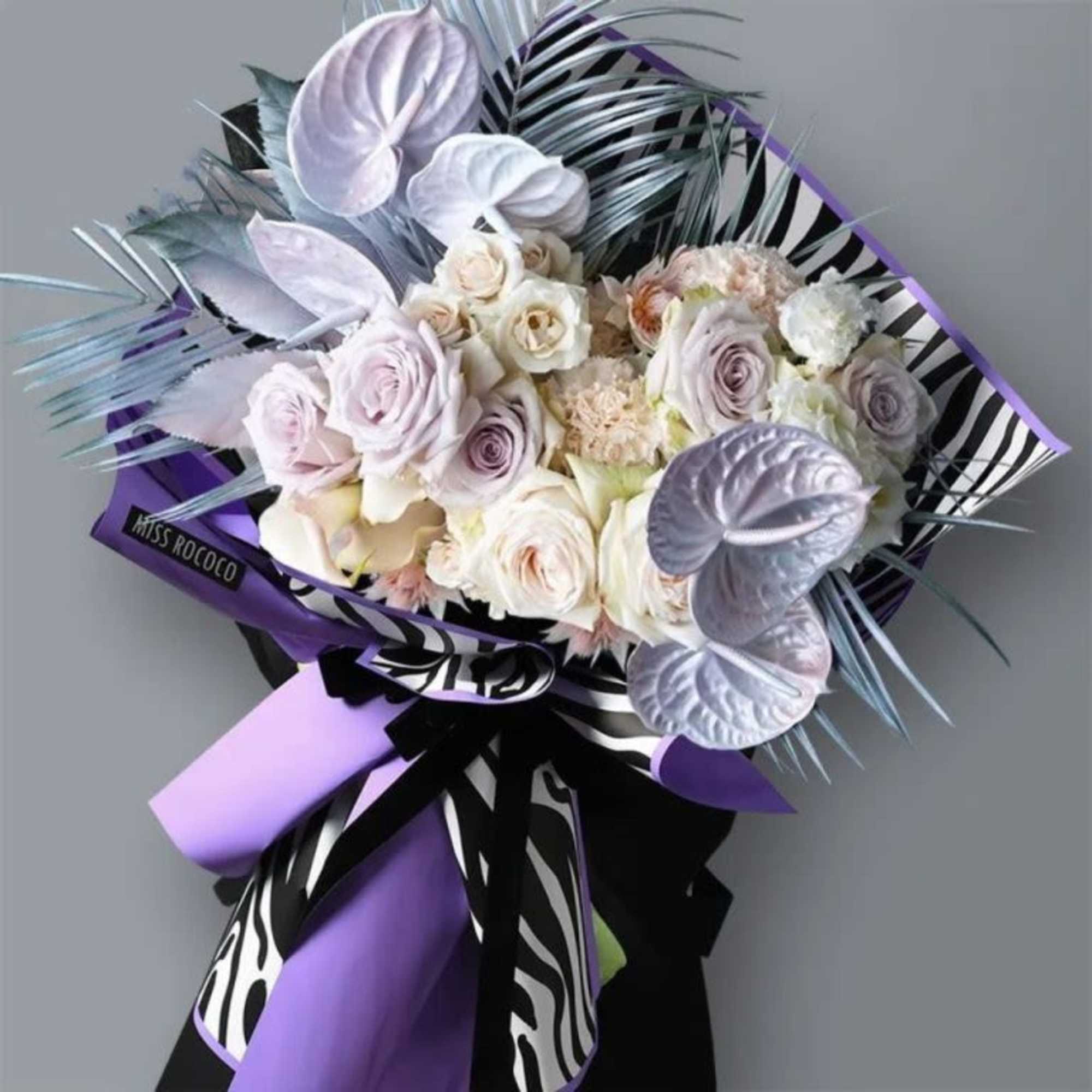 Celebrate with drama, style, and floral power!!

Honor their achievement with a show-stopping