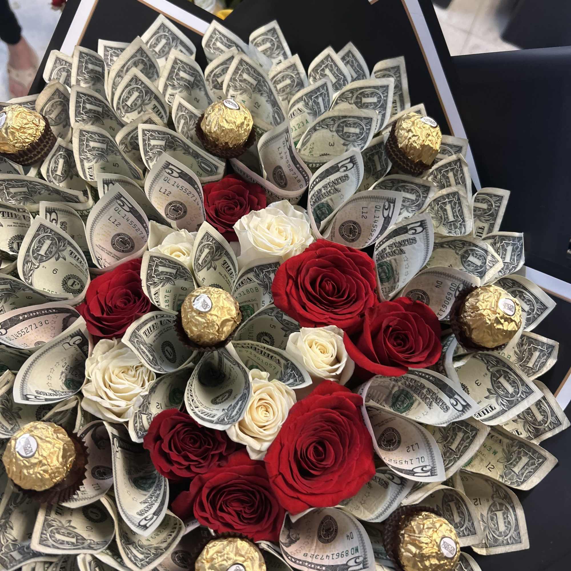 100 one dollar bills made into a beautiful bouquet. Custom made to 100 one dollar bills made into a beautiful bouquet. Custom made to