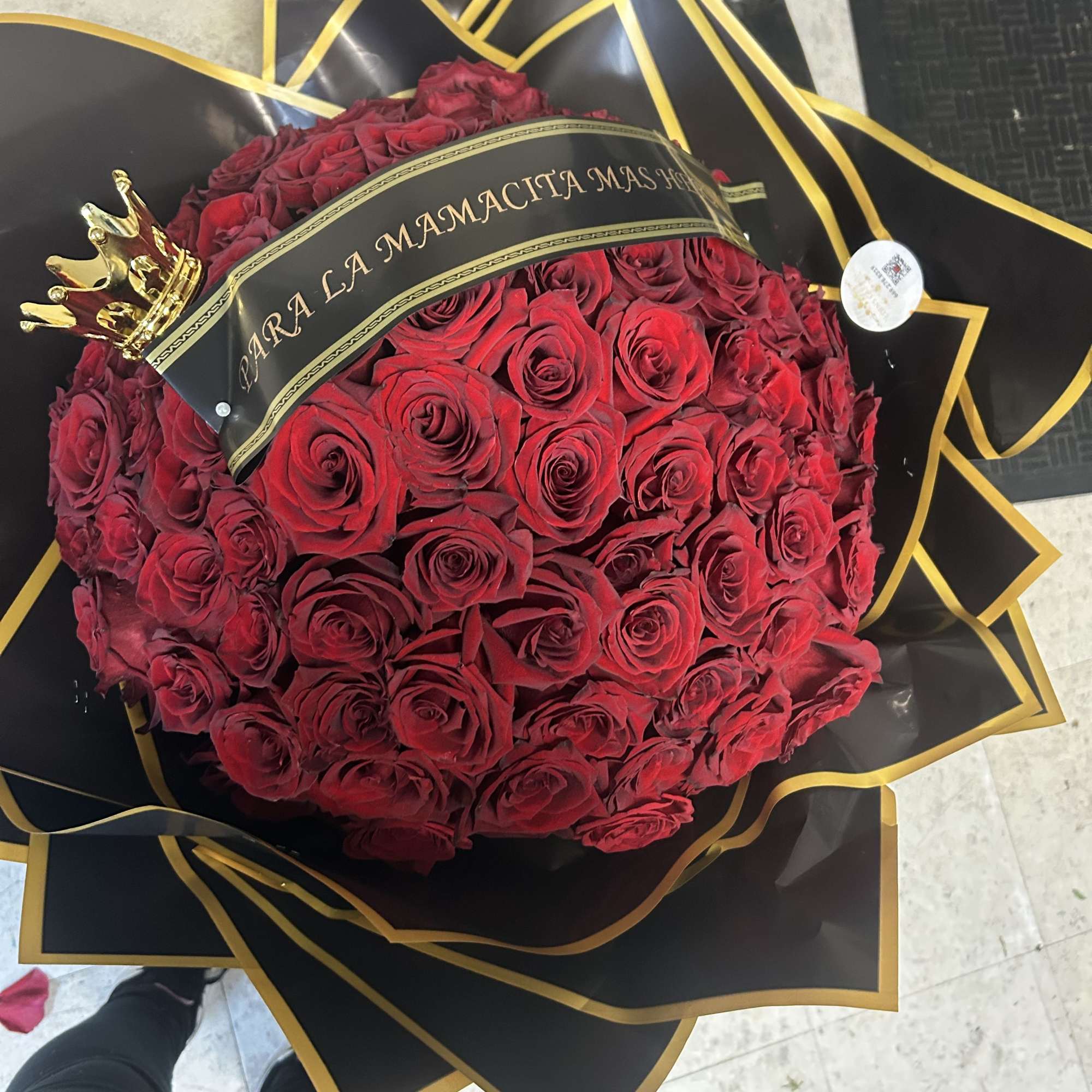 Buchon style wrapped 100 roses. Color of choice.  Buchon style wrapped 100 roses. Color of choice.