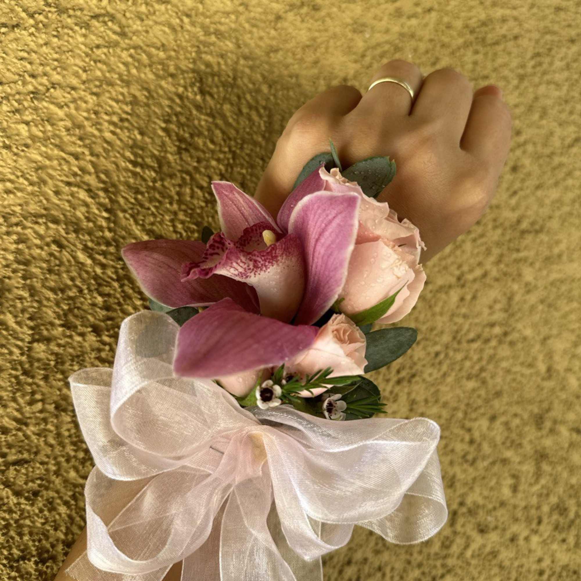 Set of Corsage and Boutonniere include pink cymbidium orchid and pink spray