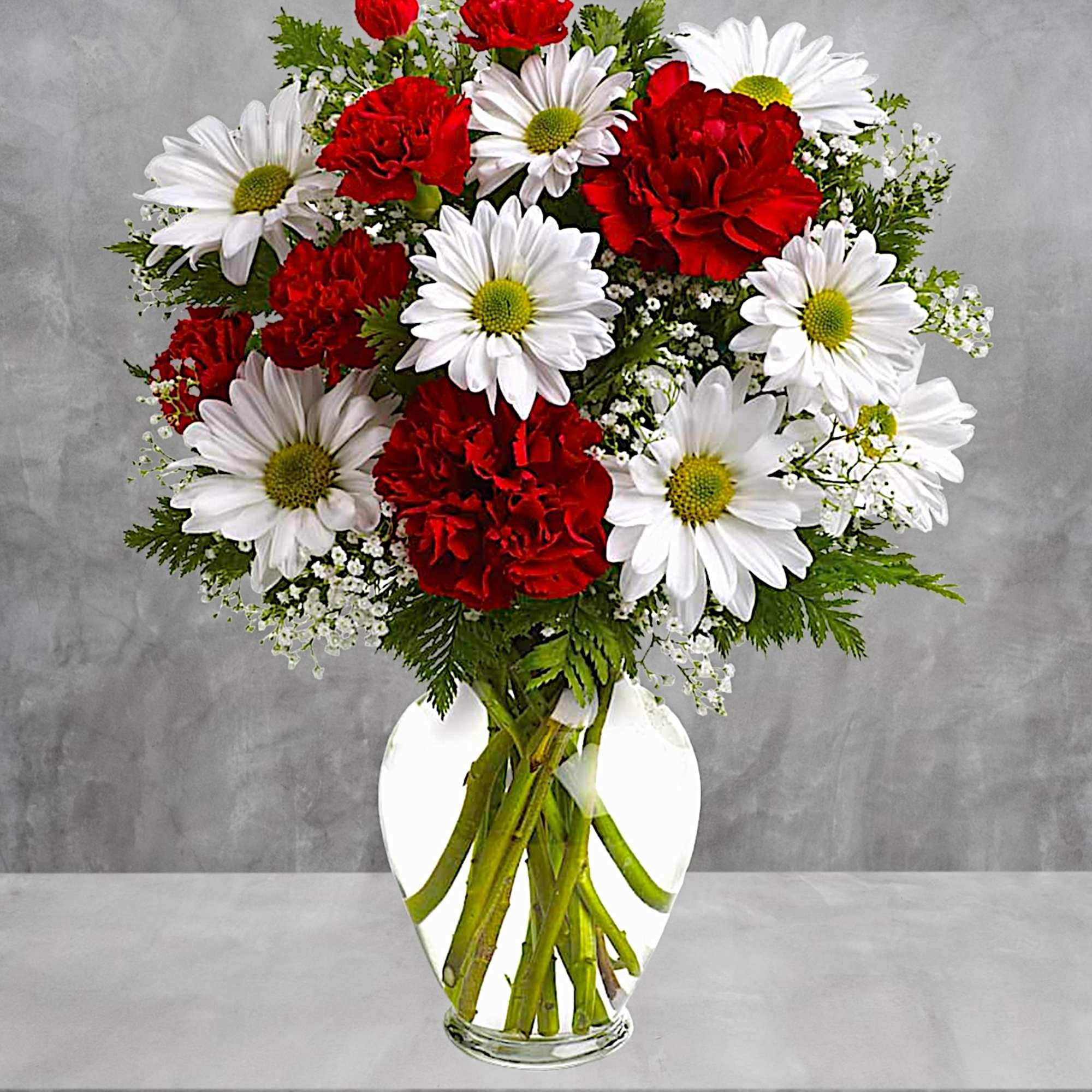 Share your heart&#039;s true feelings with this delightful red and white arrangement.