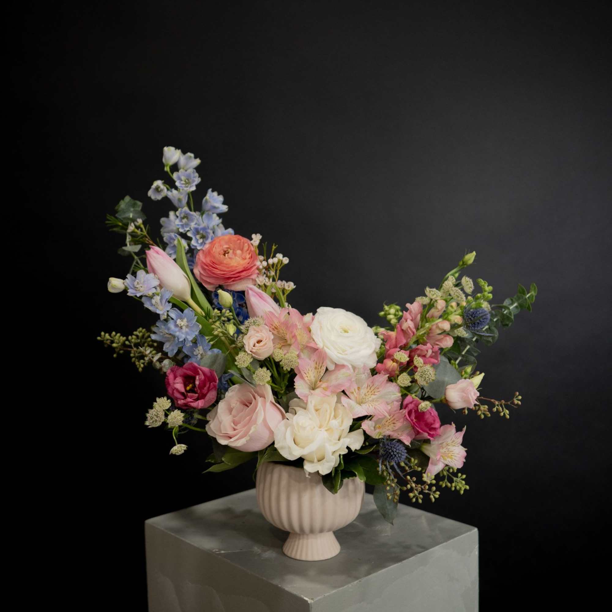 Our &quot;Harbour Island&quot; arrangement captures the serene beauty of water and pink