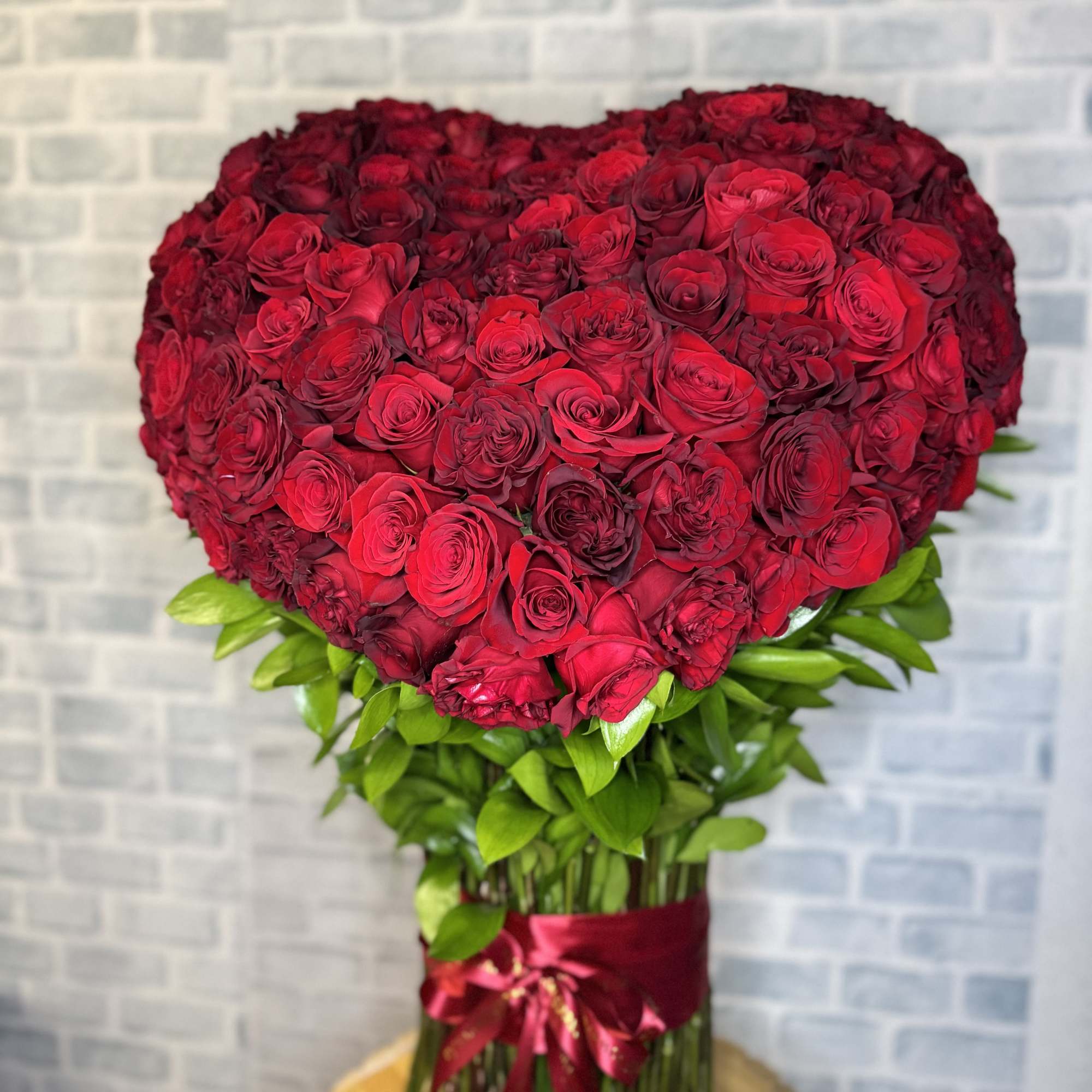 125 roses beautifully arranged in a heart shaped for me a beautiful 125 roses beautifully arranged in a heart shaped for me a beautiful
