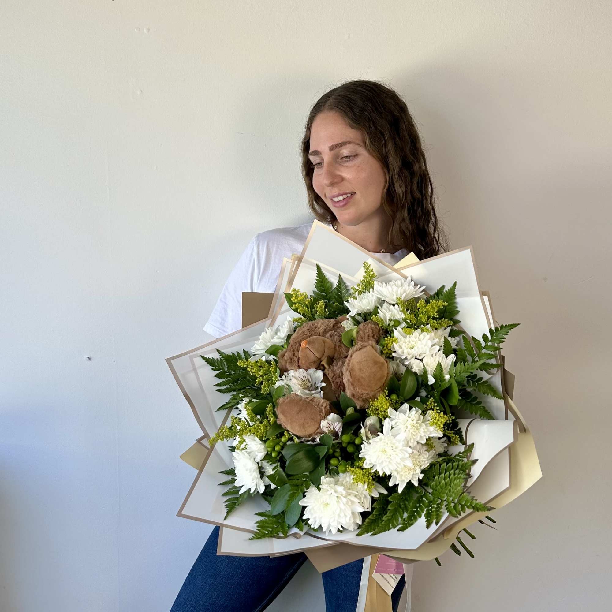 A heartwarming blend of flowers and cuddles!
Our Teddy Bloom Bouquet is a