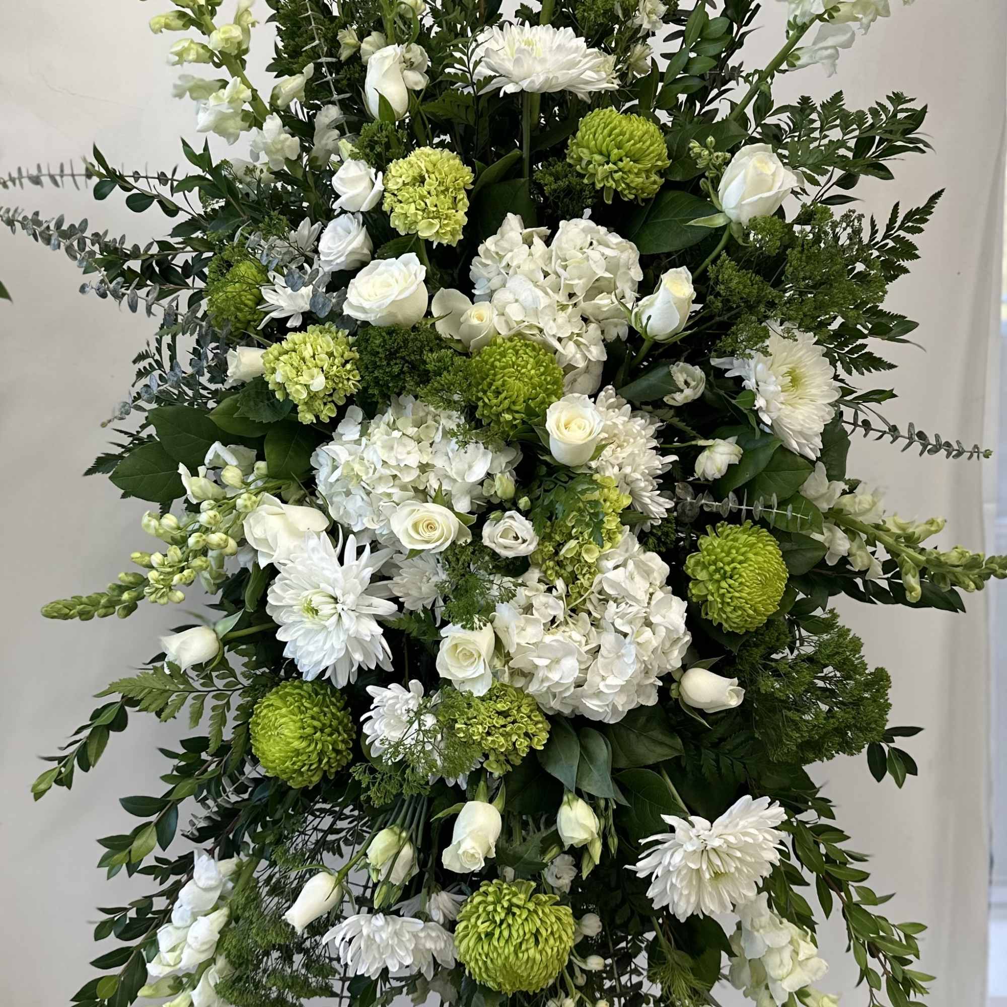 When words fail, let our Standing Proud Sympathy Arrangement convey your heartfelt