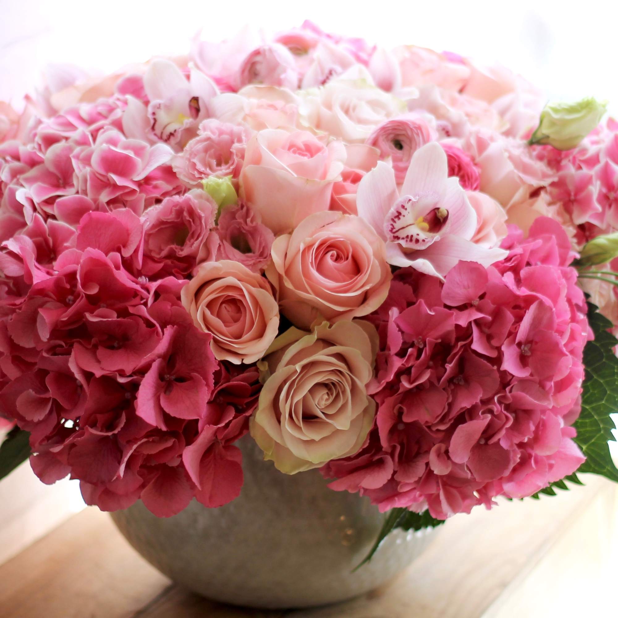 Large bowl vase filled with gorgeous hydrangeas, peonies, anthurium and roses. NOT