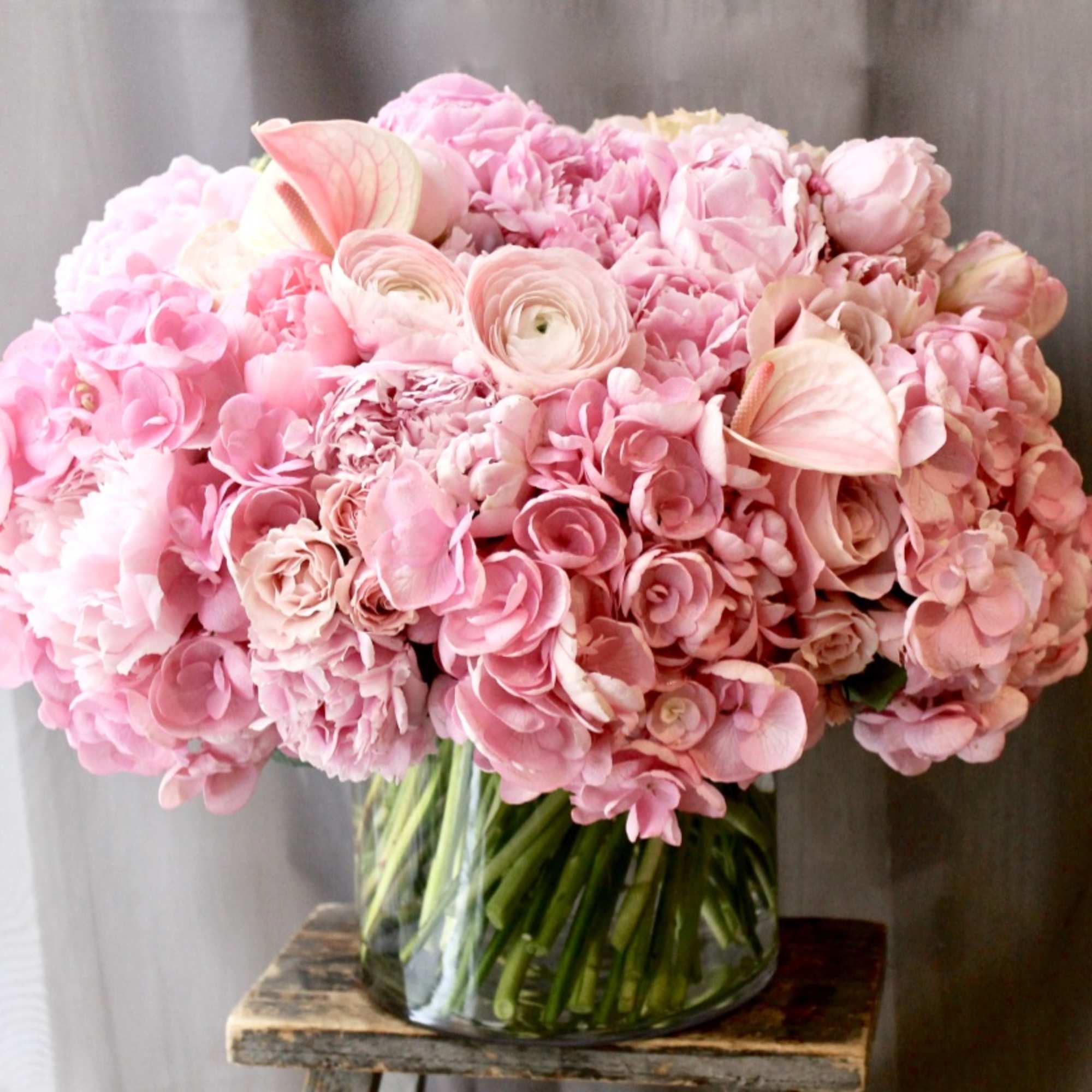 Large bowl vase filled with gorgeous hydrangeas, peonies, anthurium and roses. NOT