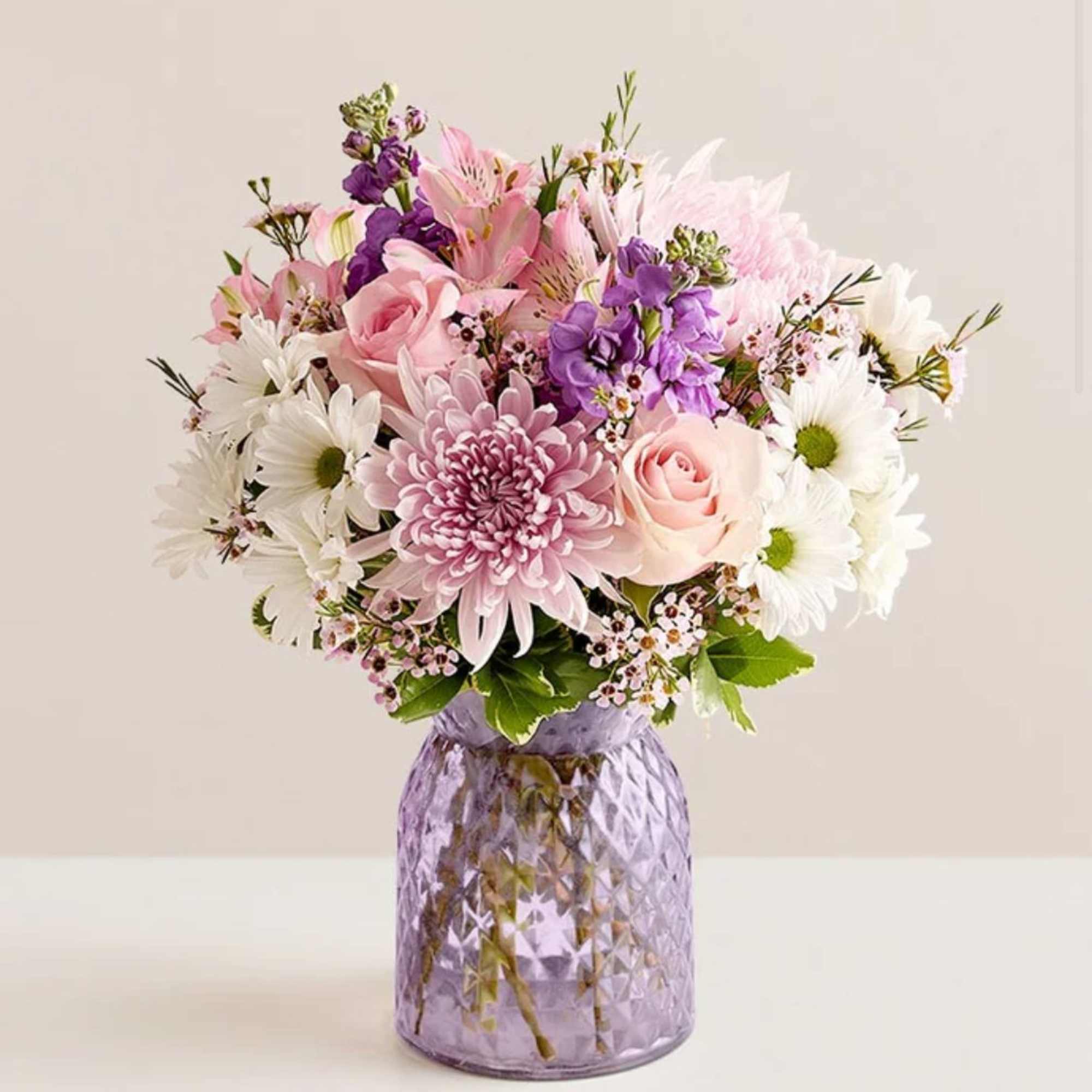 NEW Inspired by the beauty of a blooming backyard garden, our bouquet