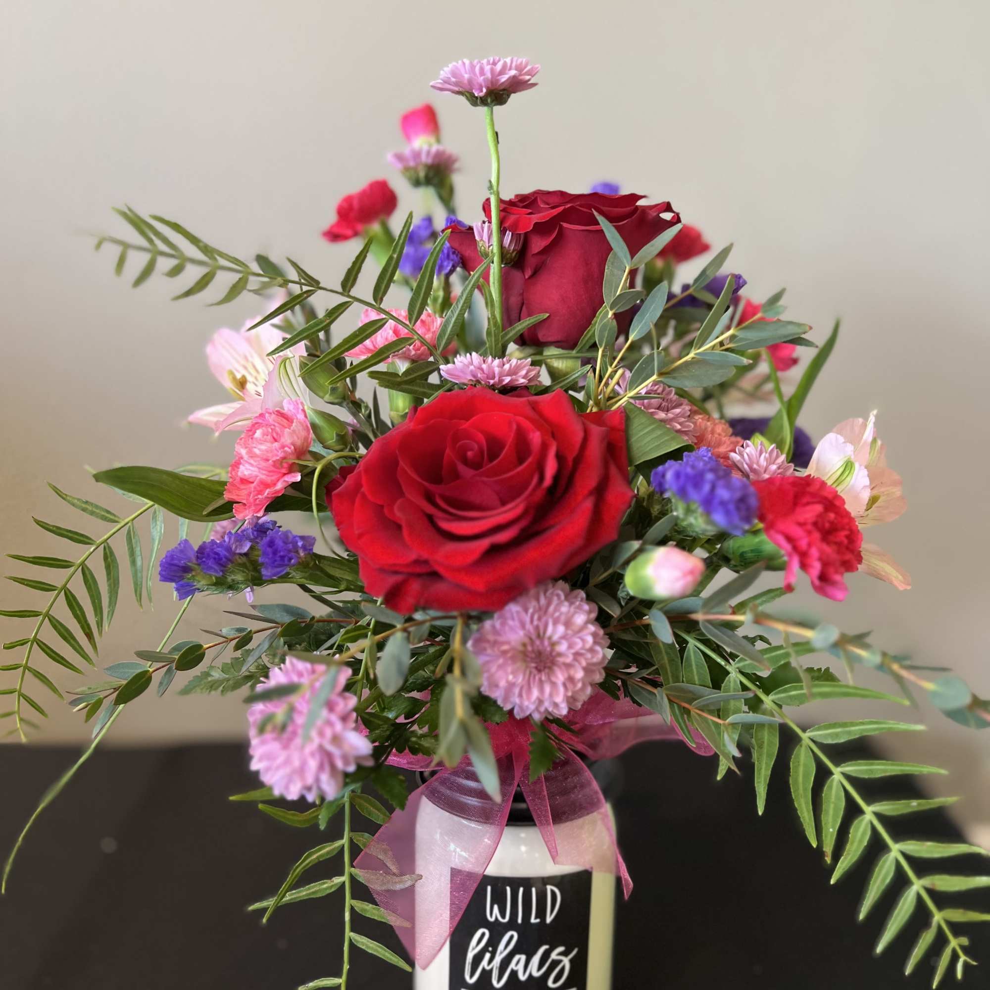 A unique arrangement, placed on top of a candle! The perfect two A unique arrangement, placed on top of a candle! The perfect two