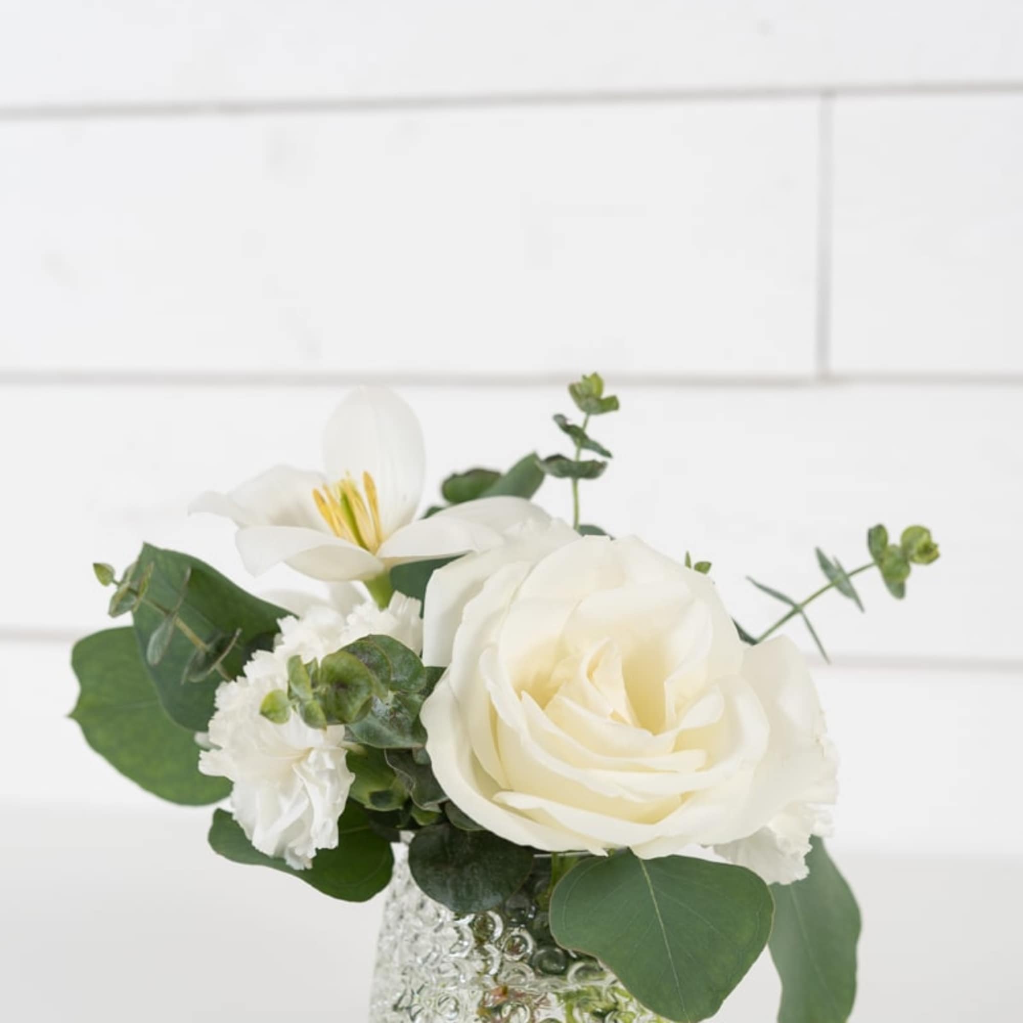 Sweet petite arrangement in a sleek minimal style.