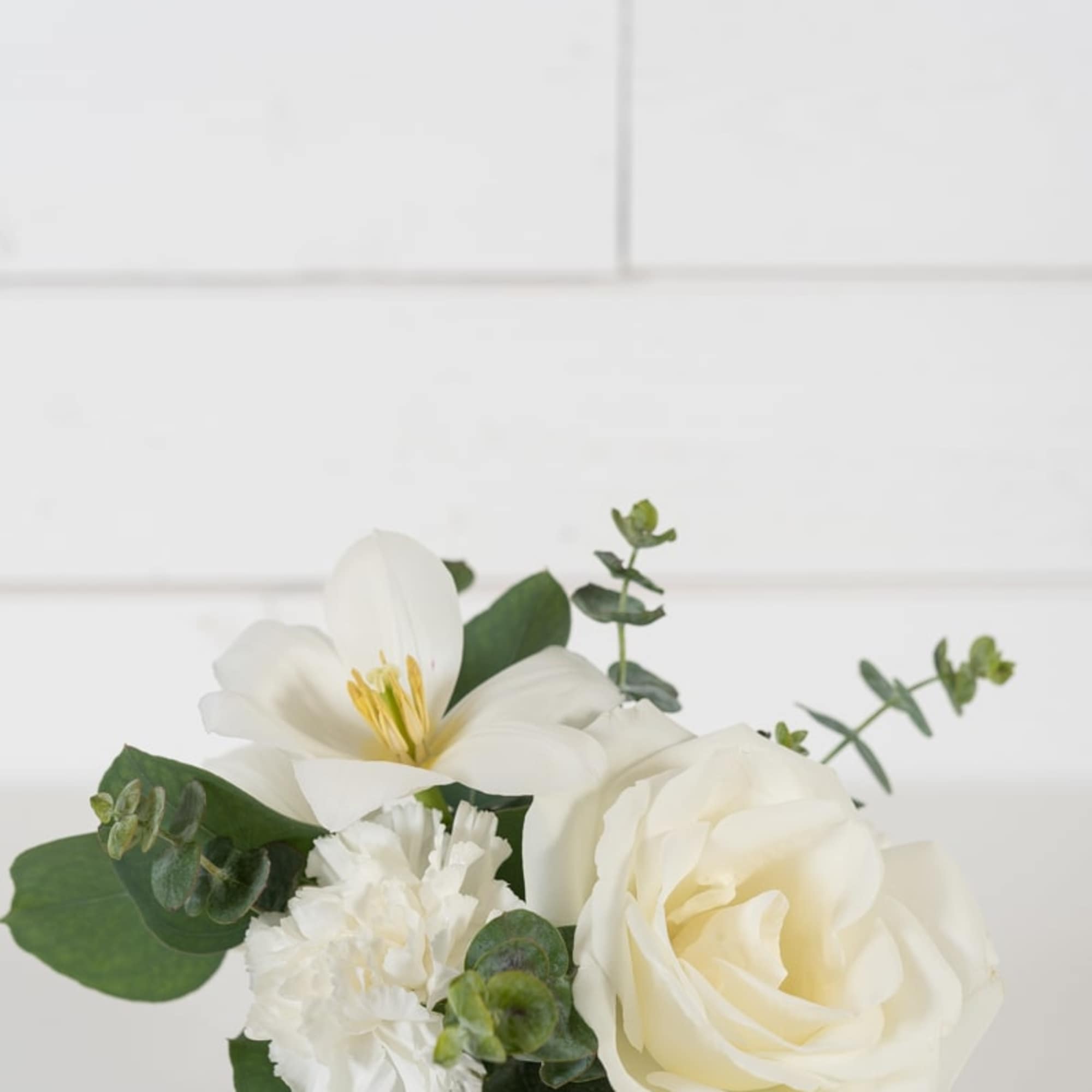 Sweet petite arrangement in a sleek minimal style.
