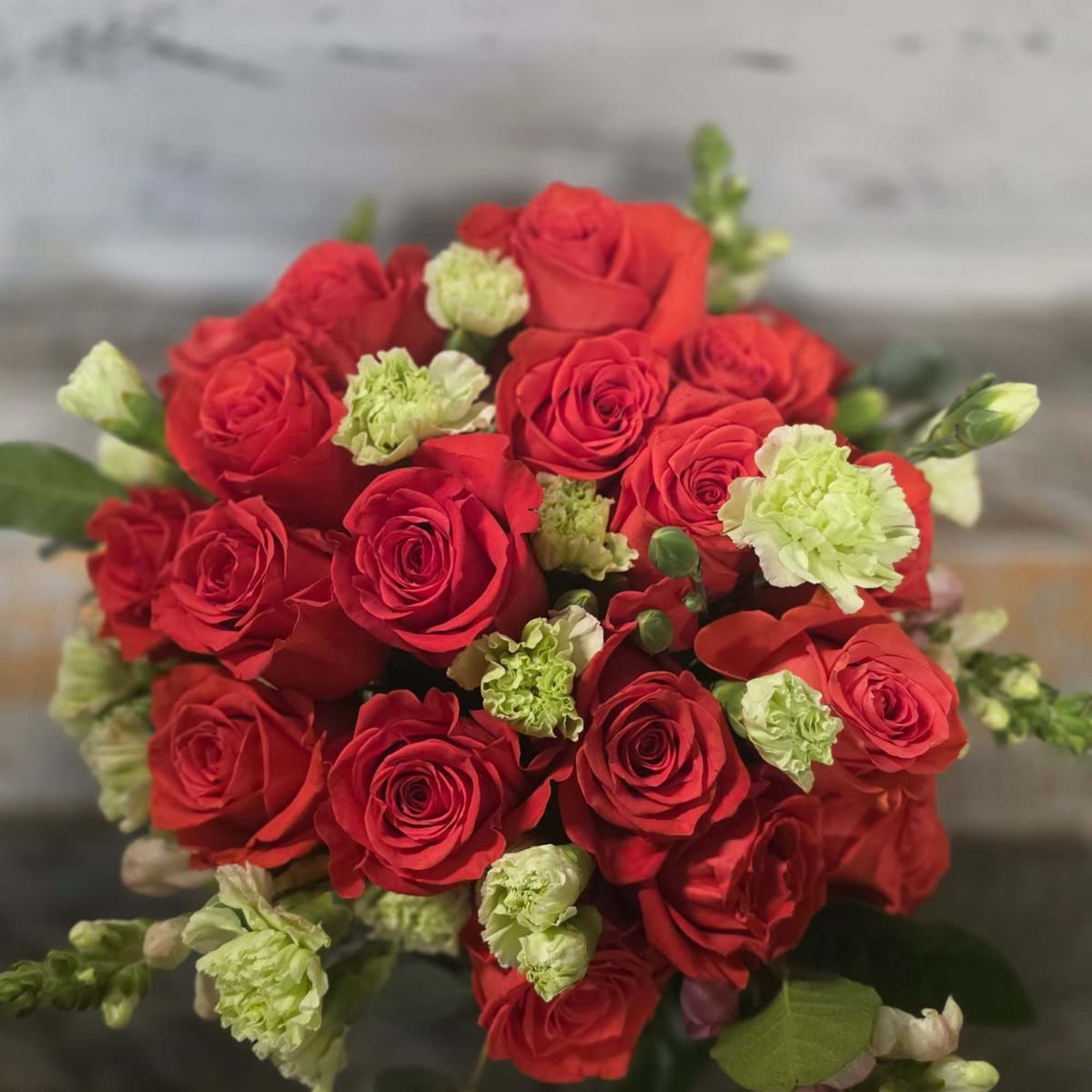 Introducing the enchanting &#039;Orange Blossom&#039; design &ndash; bright orange roses elegantly arranged
