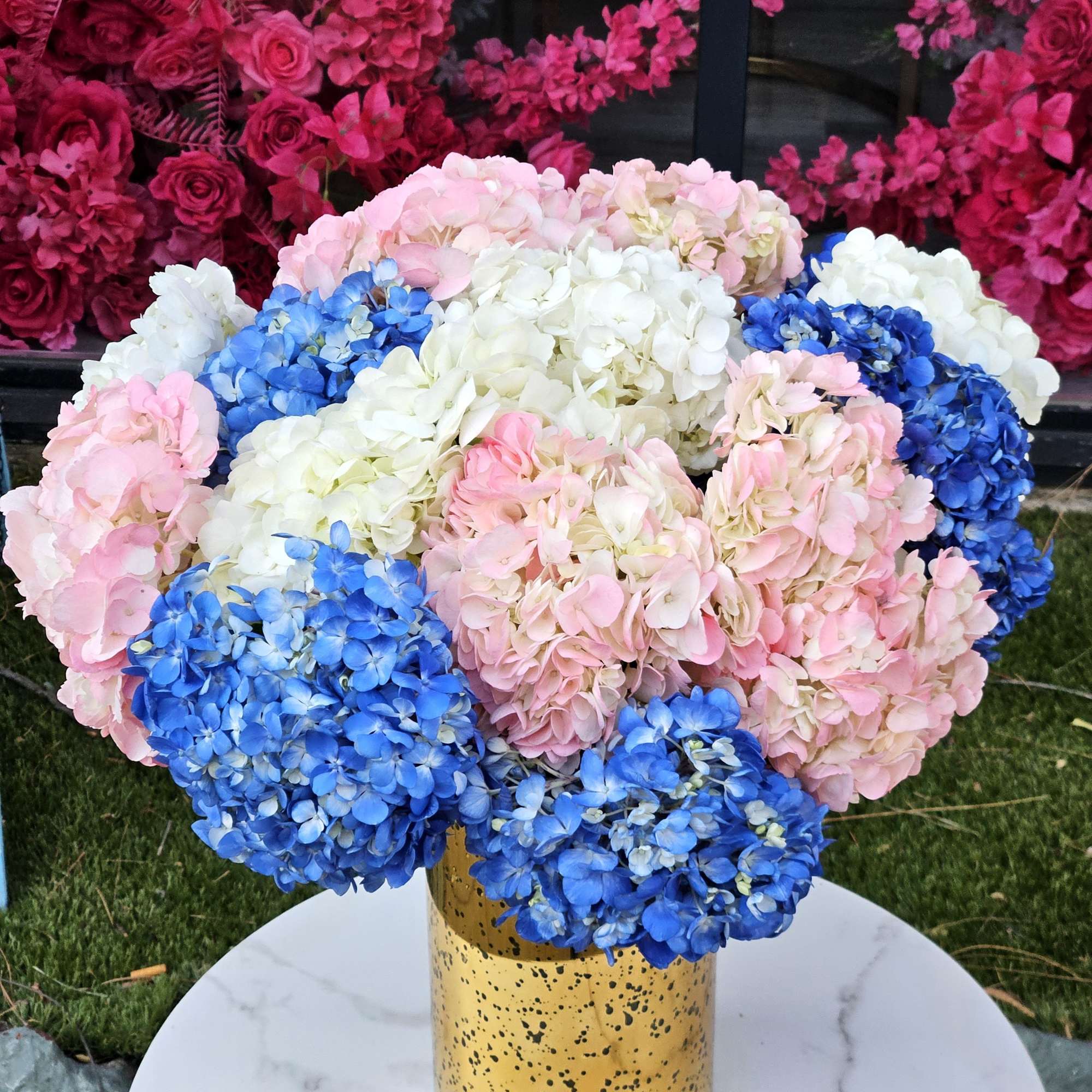 Our Pink, Blue, and White Hydrangea Bouquet features stunning hydrangeas beautifully arranged