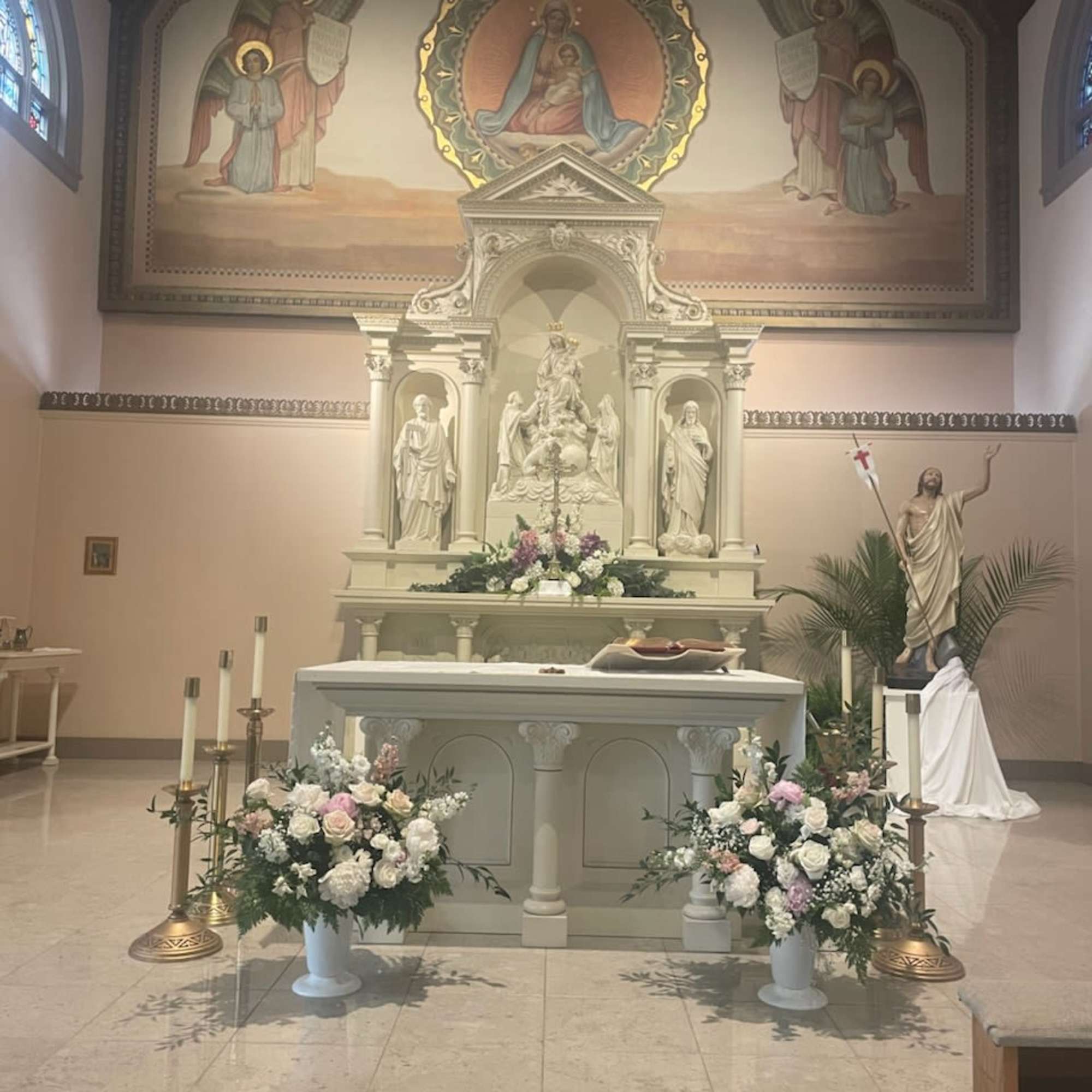 Beautiful light pastel pink, off white and white flowers floor altar vases