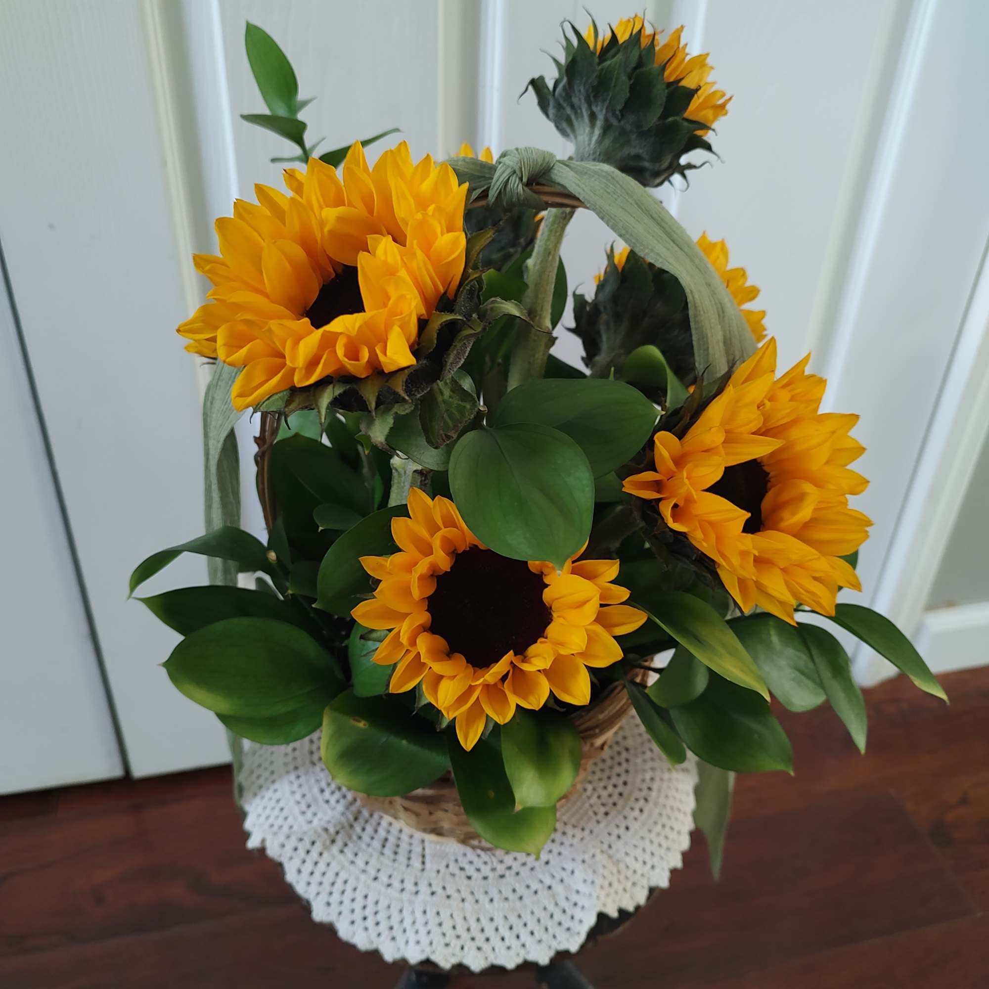 Simple basket of beautiful sunflowers. 