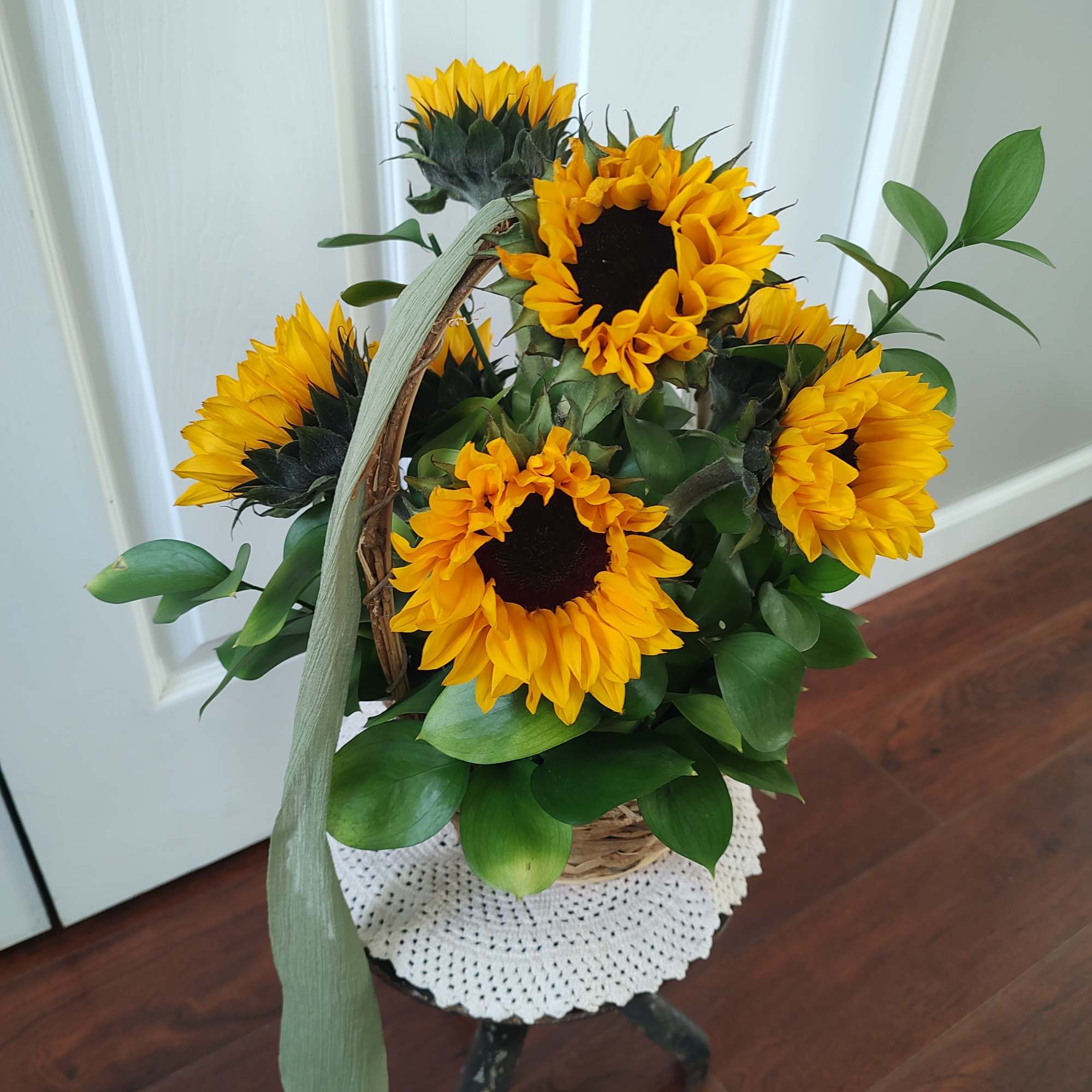Simple basket of beautiful sunflowers. 