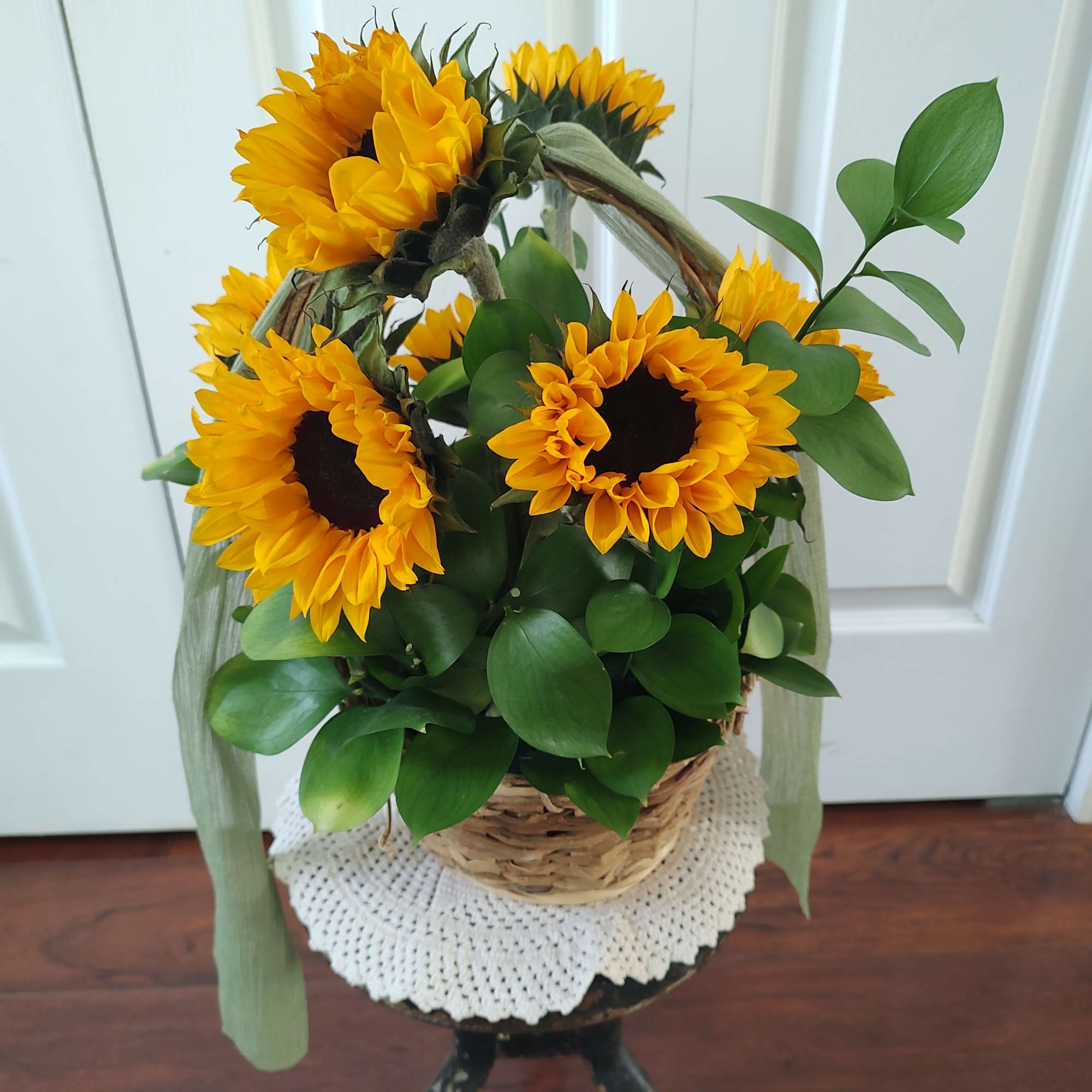Simple basket of beautiful sunflowers. 