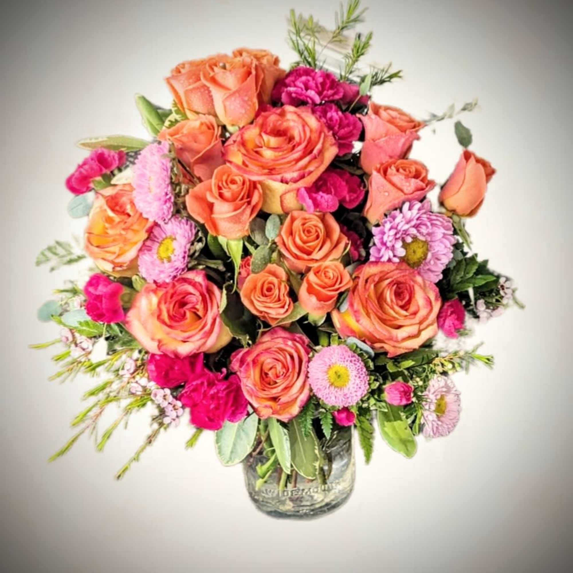 Radiating the warm hues of a glowing sunset, Sunset Bliss bursts with