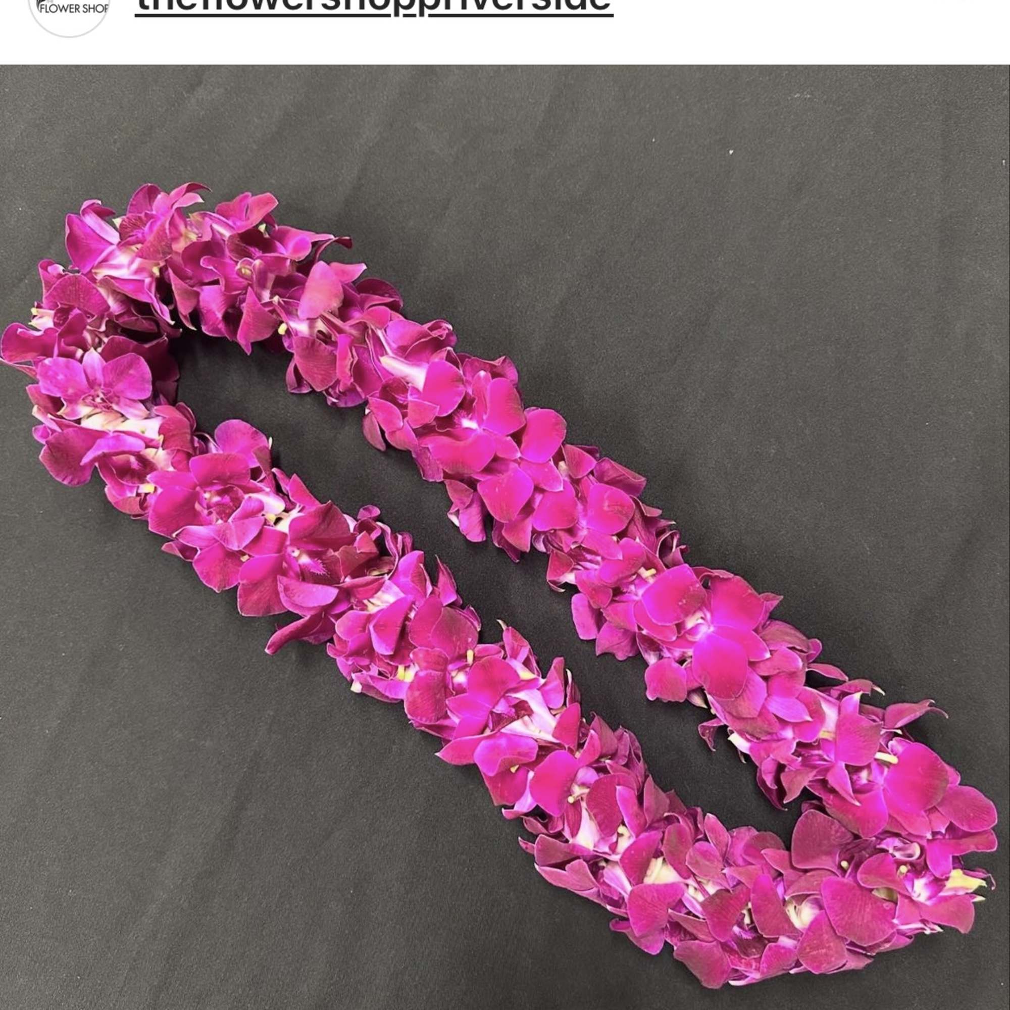 Graduation lei, need to call for color availability. Some colors include white