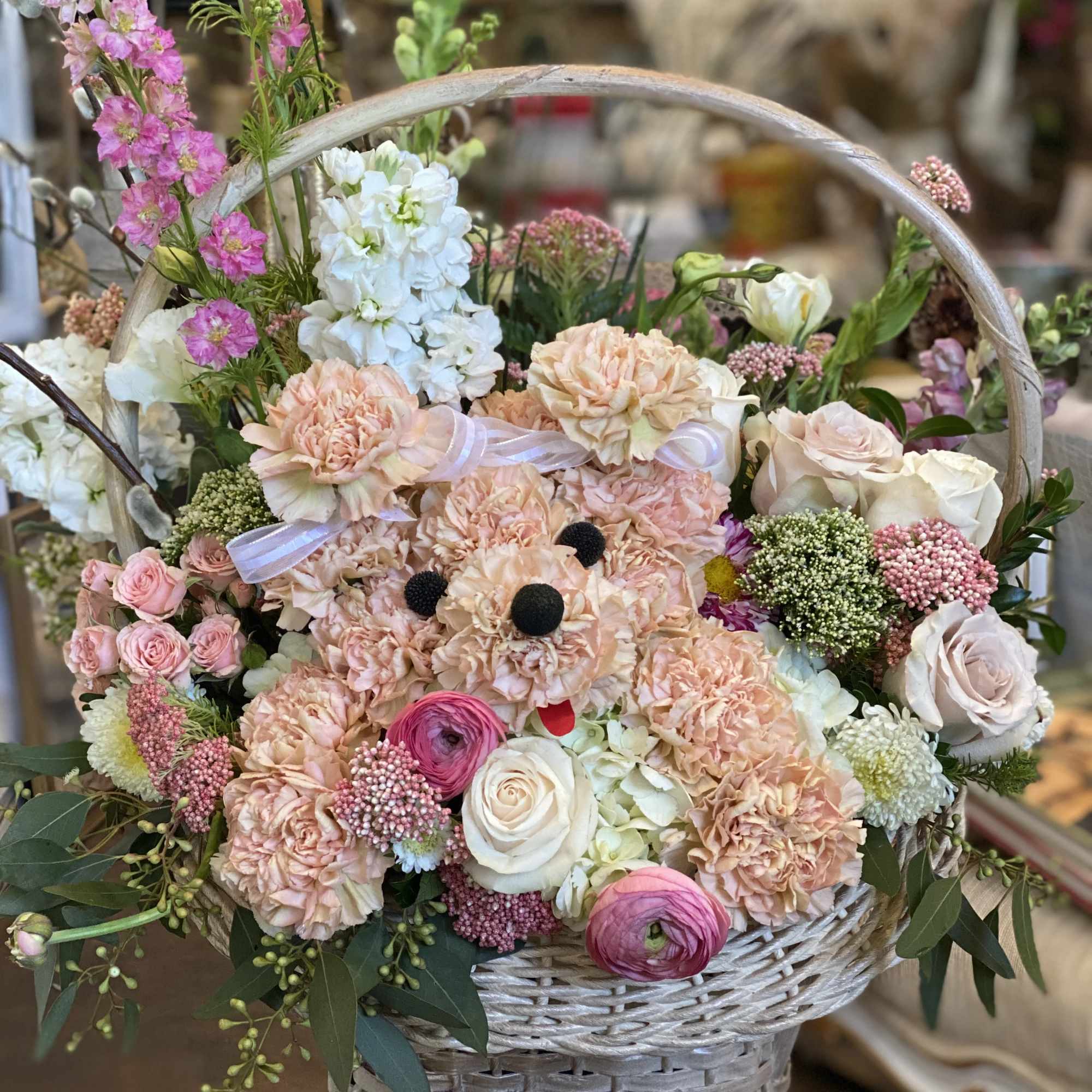  Original pup arrangement! Hand-designed inside a basket, with carnations, assorted poms
