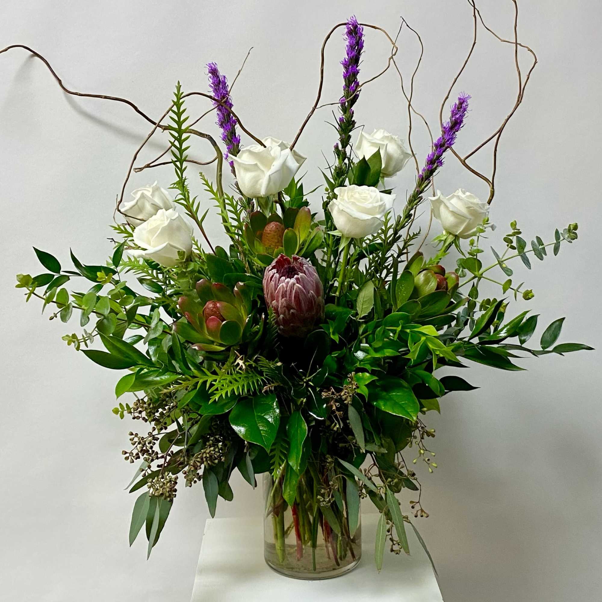 Picture shown is the Premium Size. Feathers not included. Designers Choice Item.