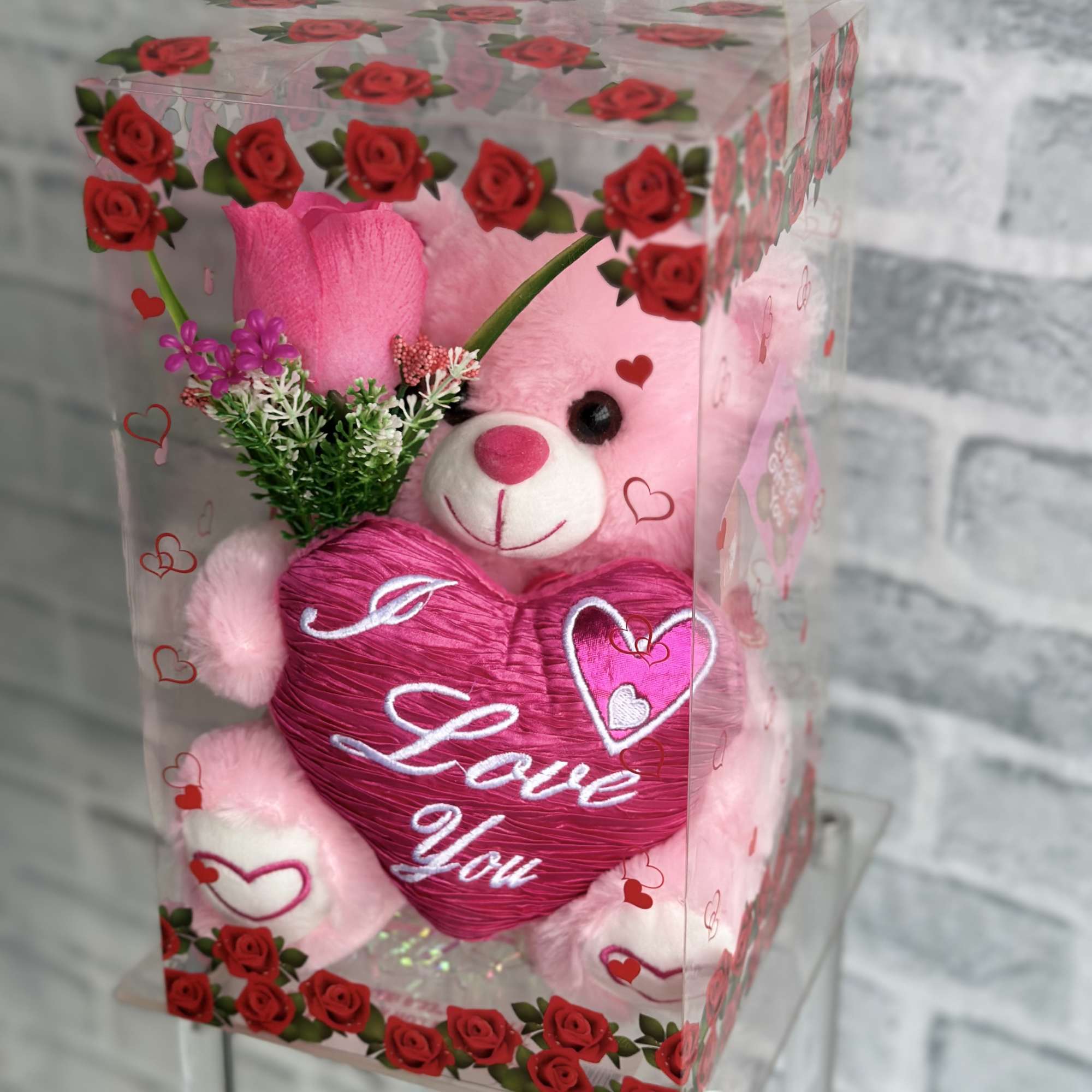 Little teddy bear, holding your rose and a heart in a clear Little teddy bear, holding your rose and a heart in a clear