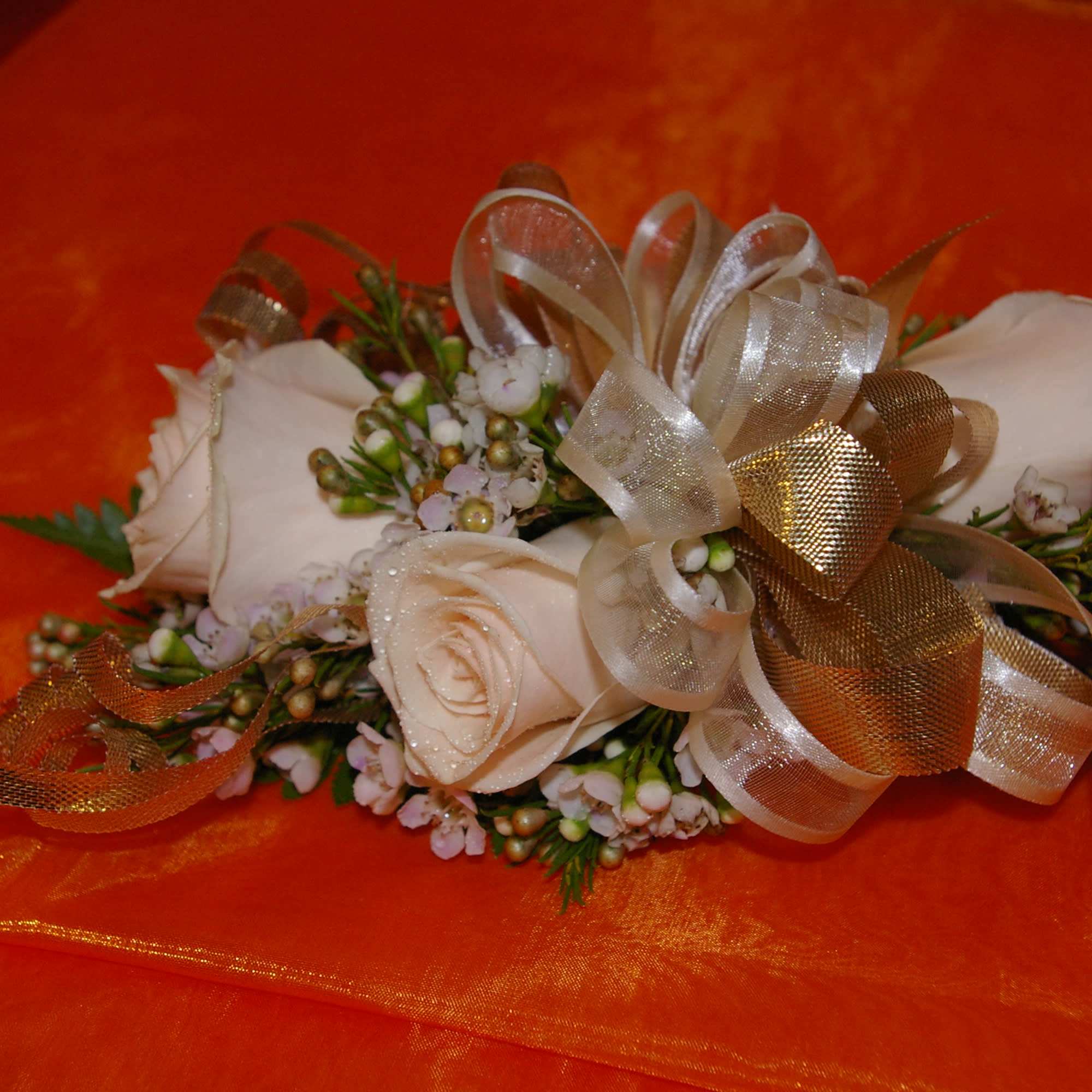 light pink  roses with colorful miniature flowers