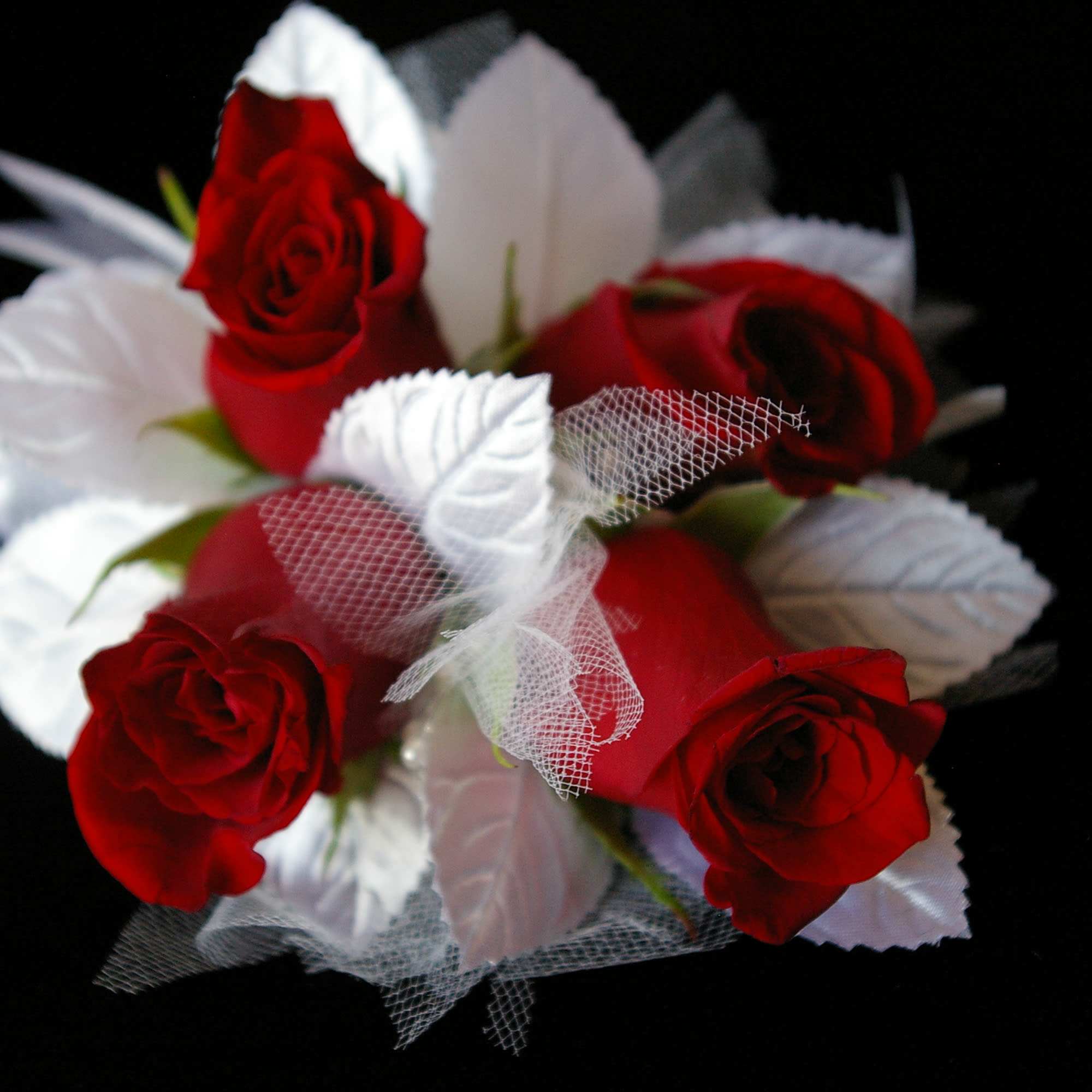 light pink  roses with colorful miniature flowers