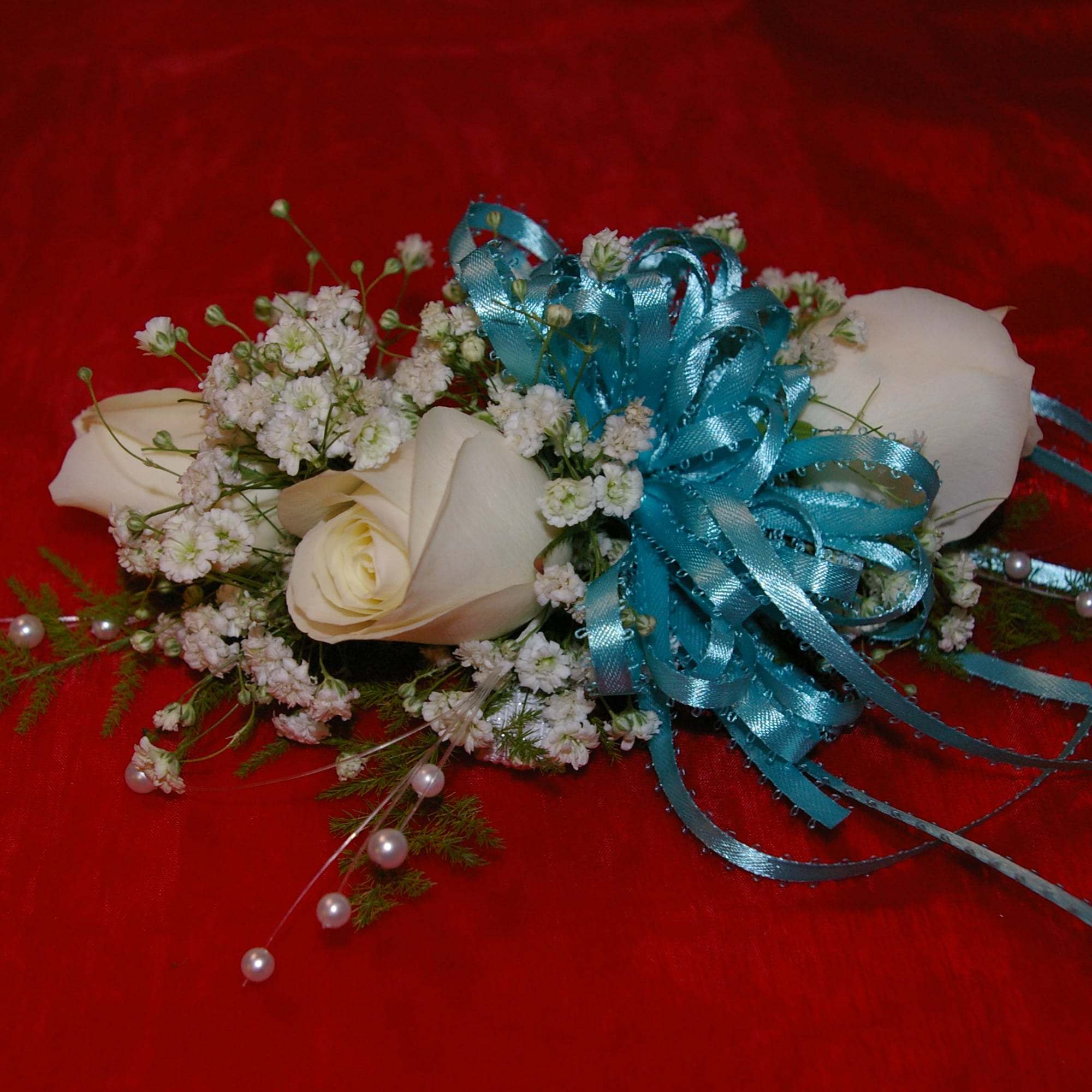 light pink  roses with colorful miniature flowers