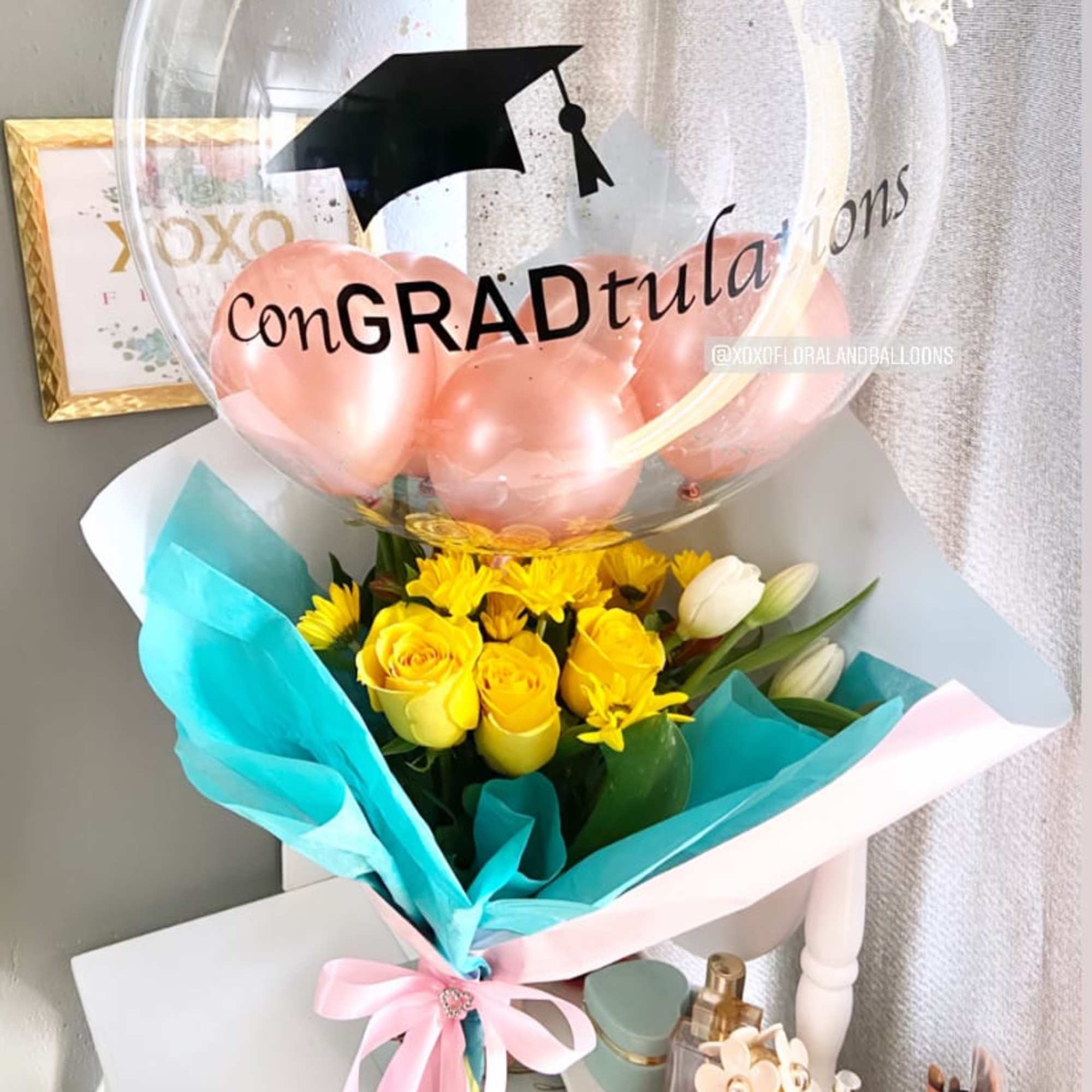 Send this unique floral bouquet with a customized balloon to your loved