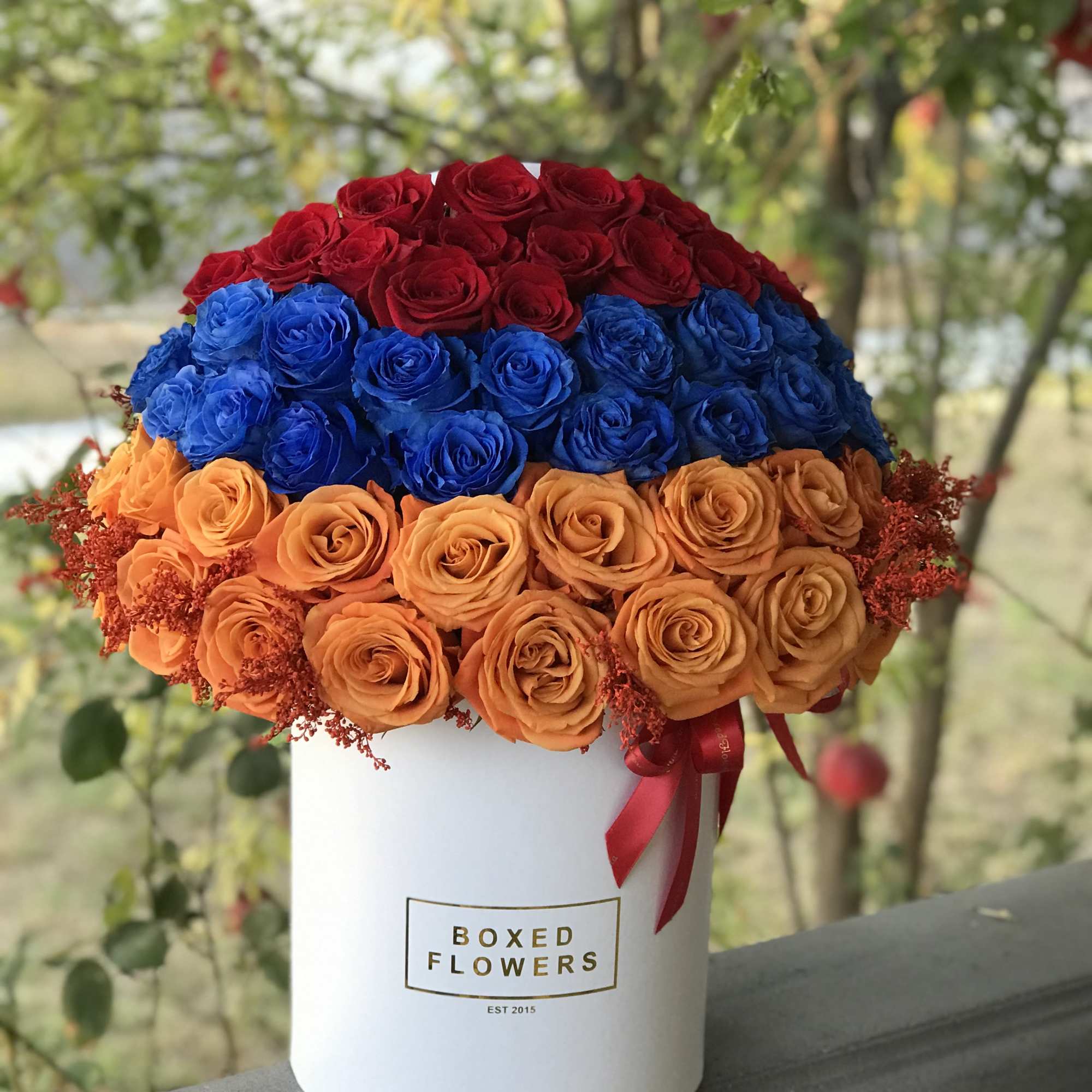 Beautiful one of a kind arrangement that mimics the colors of the Beautiful one of a kind arrangement that mimics the colors of the