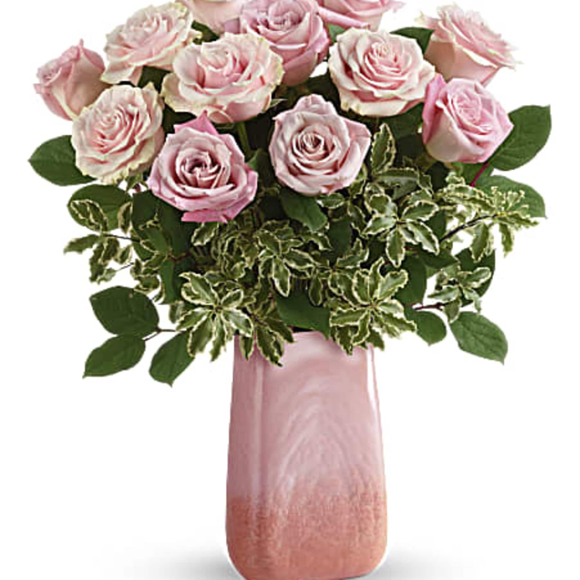 One dozen lush pink roses look absolutely divine in this cherry quartz-inspired One dozen lush pink roses look absolutely divine in this cherry quartz-inspired