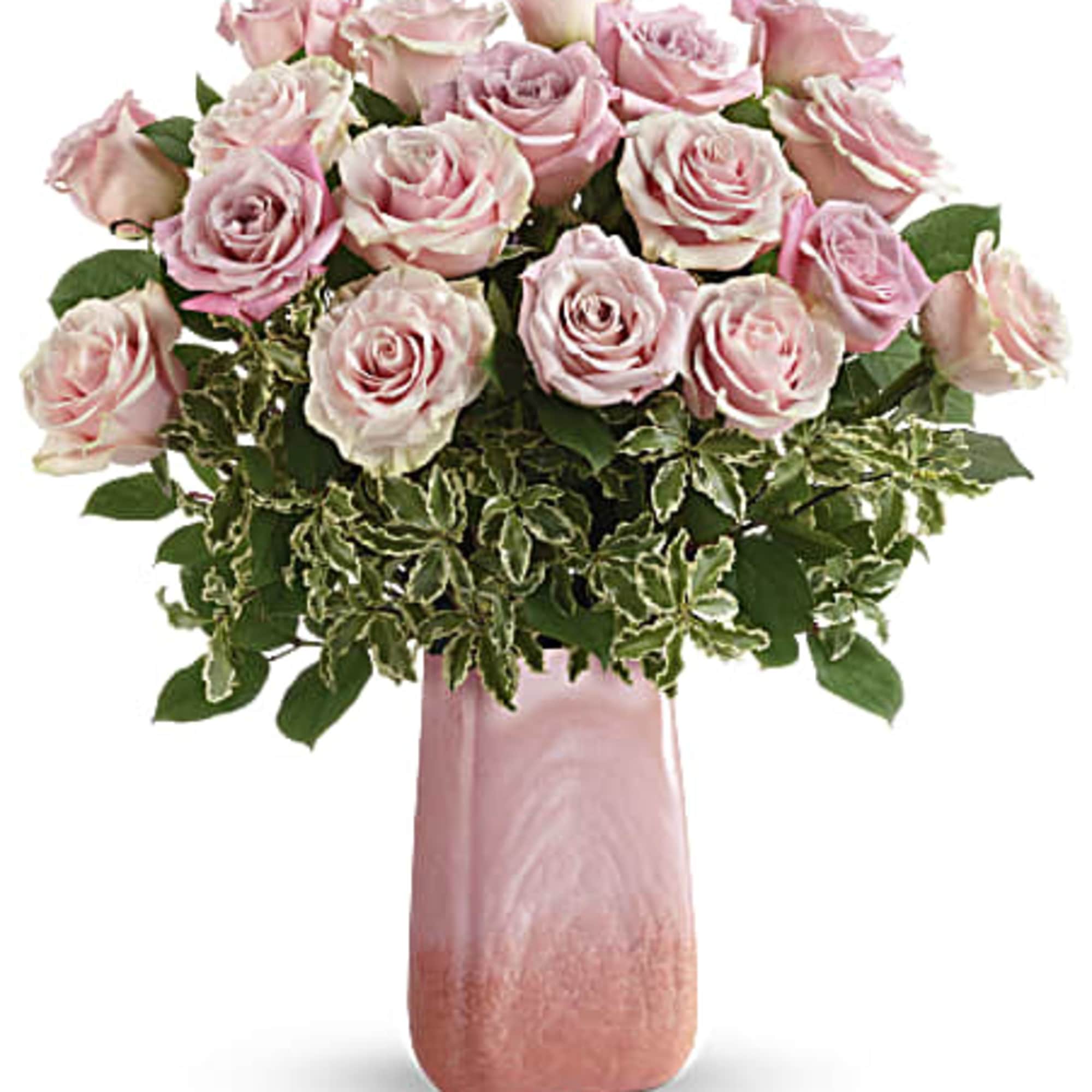 One dozen lush pink roses look absolutely divine in this cherry quartz-inspired One dozen lush pink roses look absolutely divine in this cherry quartz-inspired