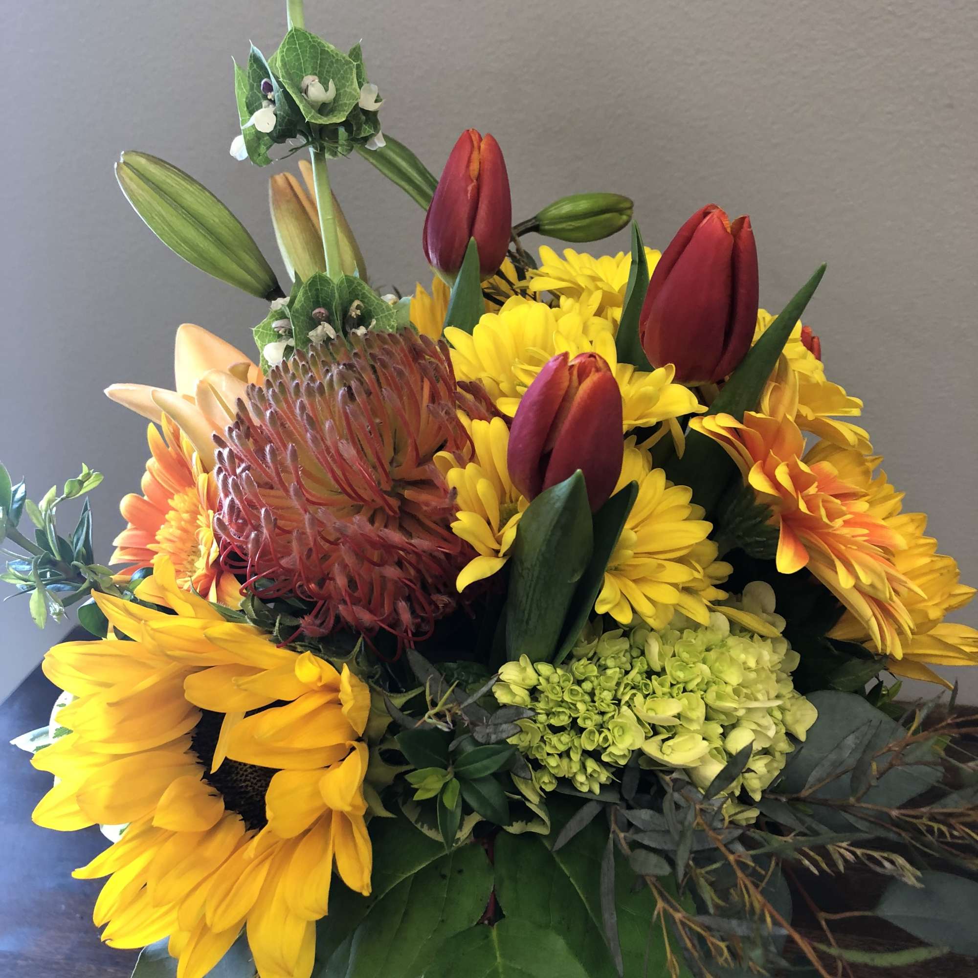 Bright colors shine in the design- orange, yellow, purple and red are